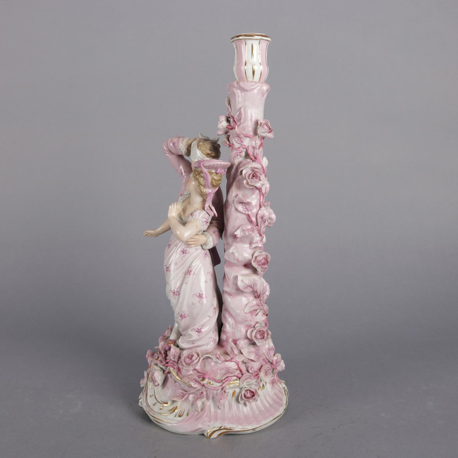 Antique Meissen Porcelain figural candlestick features hand-painted and gilt courting figures in garden setting with candle stick having applied foliate and ivy decoration, marked on base as photographed, circa 1890


Measures: 15.25
