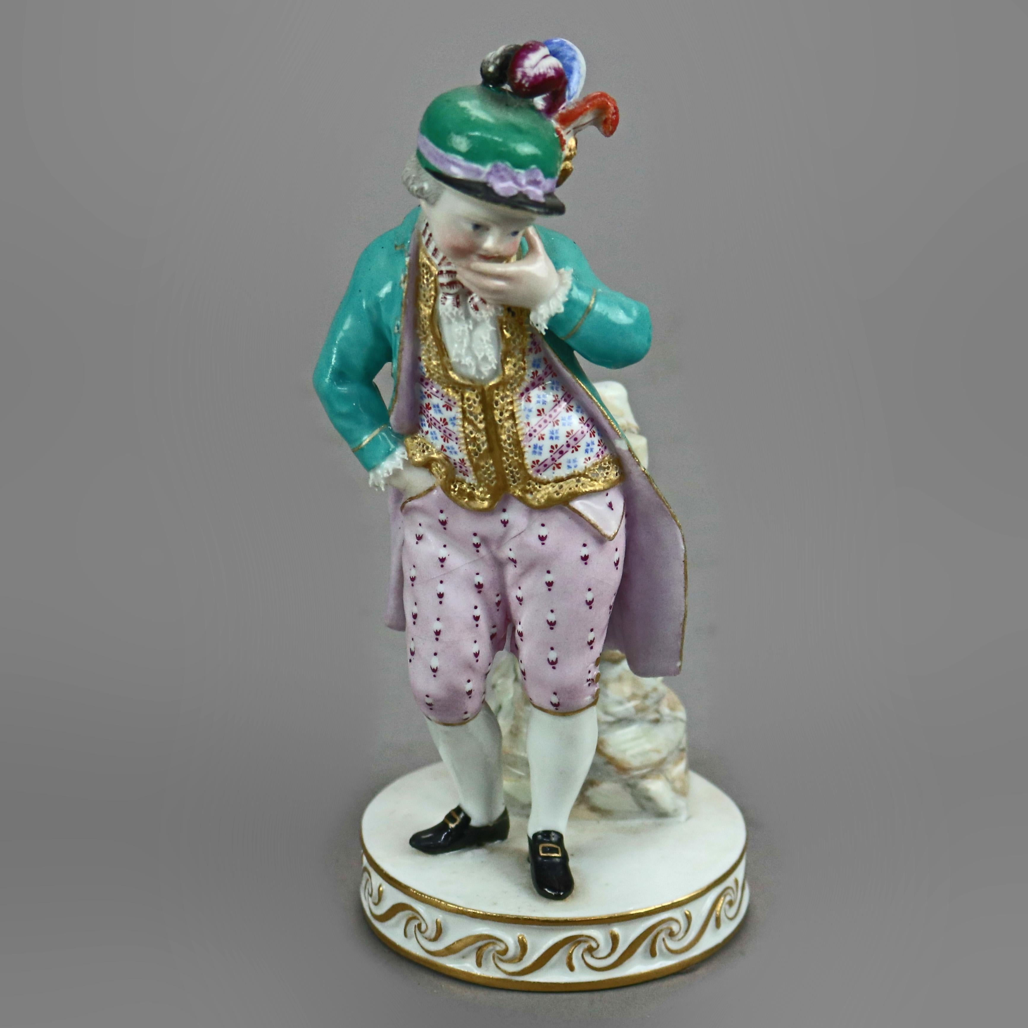 An antique German Meissen figure offers porcelain construction of a boy standing in countryside setting, hand painted with gilt highlights throughout, maker mark on base as photographed, c1890

Measures - 6.25'' H x 2.75'' W x 2.75'' D.