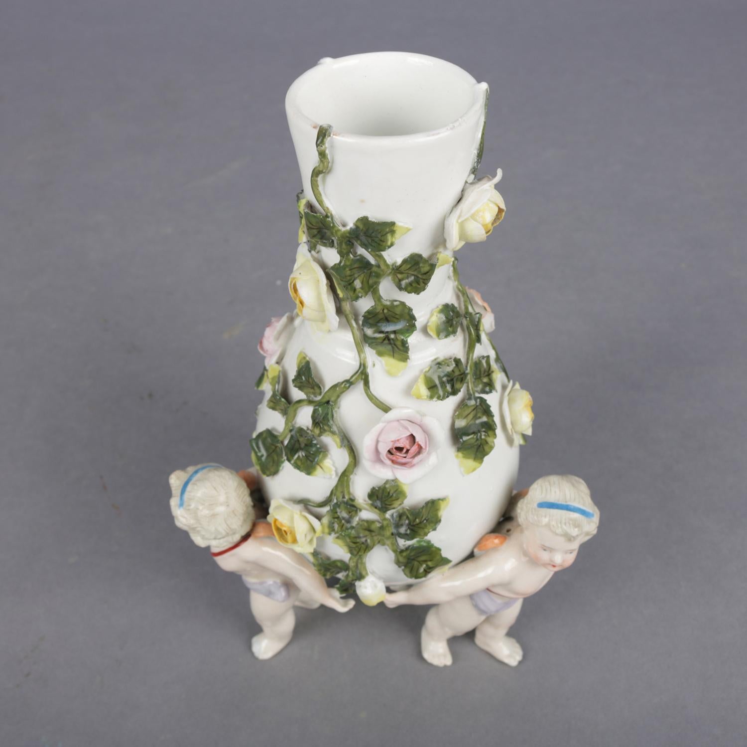 19th Century Antique German Meissen Porcelain Figural Cherub and Rose Bud Vase, circa 1890