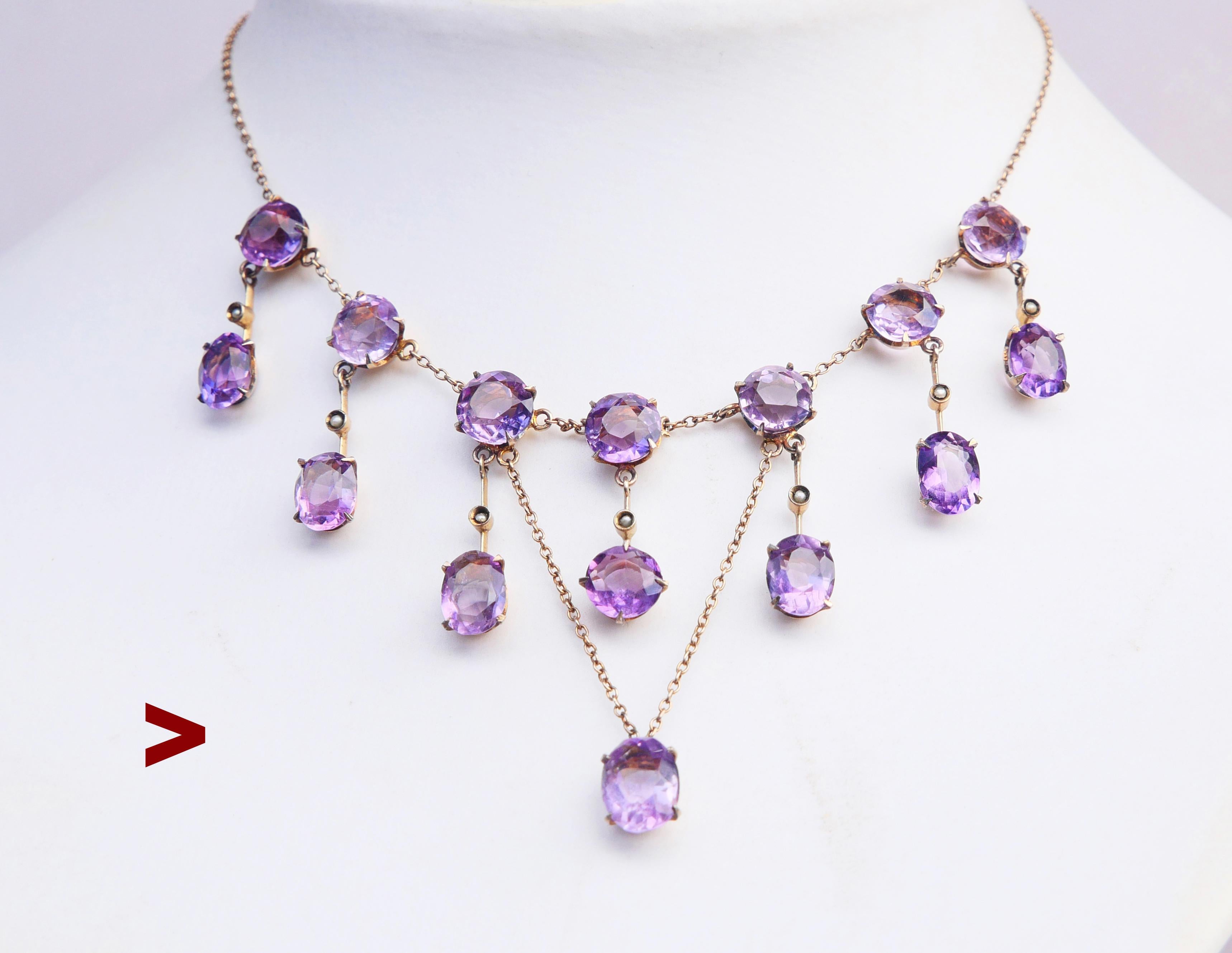  Beautiful arrangement of 15 oval and round cut of natural Amethyst stones and 7 Seed Pearls framed into chained clusters of solid Gilt Silver. Likely German necklace, hand -made ca. late 1920s -  1930s. 

The main part with stones 10.5cm long x 5cm