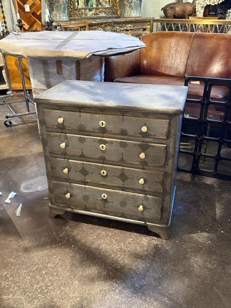 Decorative German antique painted chest of drawers. Beautiful patina and interesting design. Very unique!