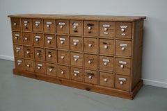Antique German Pine Apothecary Cabinet with Enamel Shields, 1900s