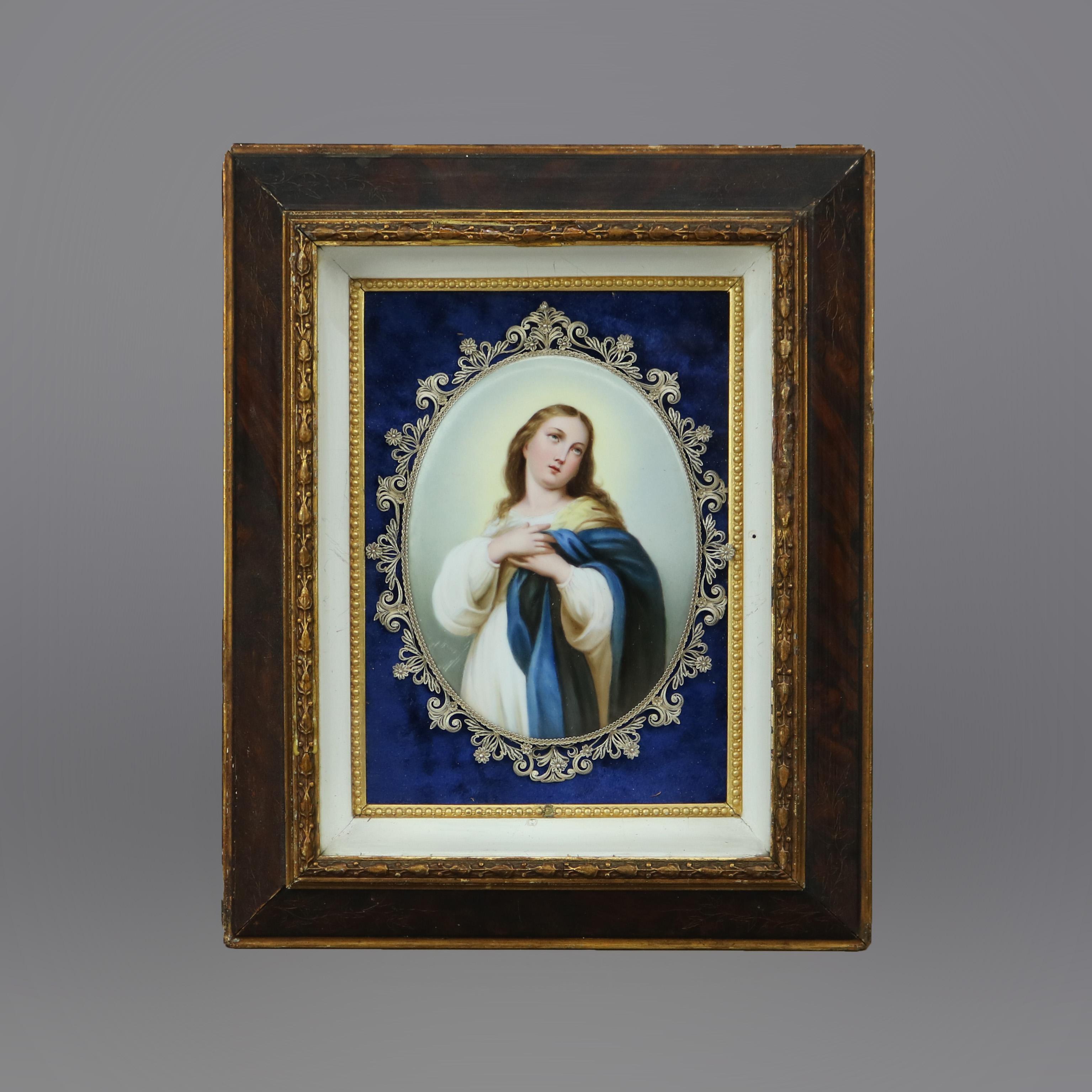 An antique German painted porcelain plaque in the manner of KPM offers portrait of Classical young woman, seated in frame with reticulated sterling silver frame, c1890

Measures - 15.25''H x 12.5''W x 2.75''D.