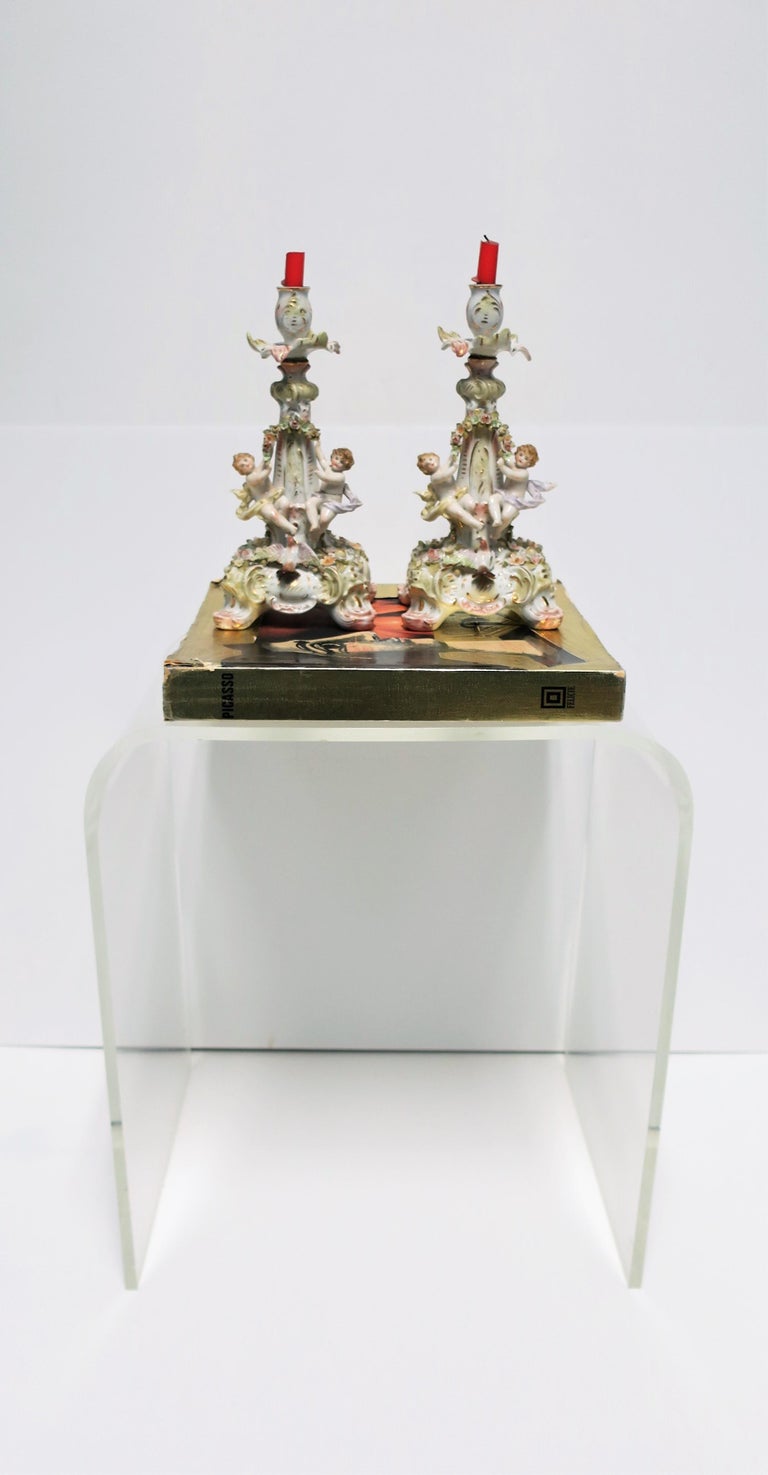 Late 19th Century Antique Rococo German Porcelain Candlestick Holders with Putti, Pair  For Sale