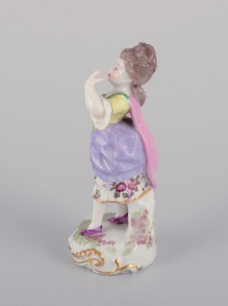 Rococo Antique German porcelain figurine. Young woman in elegant attire.  For Sale