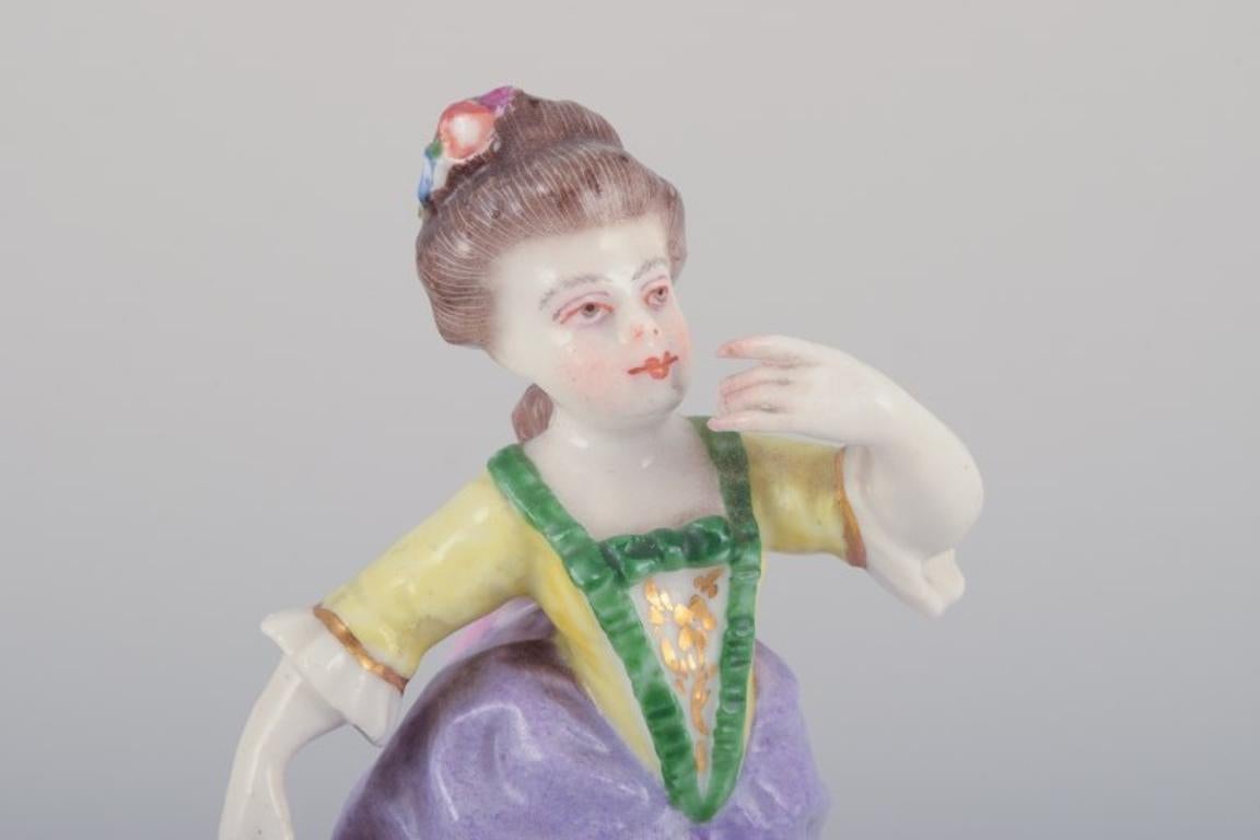 19th Century Antique German porcelain figurine. Young woman in elegant attire.  For Sale