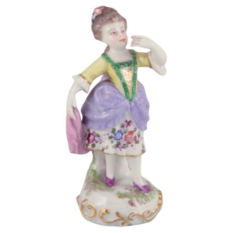 Antique German porcelain figurine. Young woman in elegant attire.  For Sale