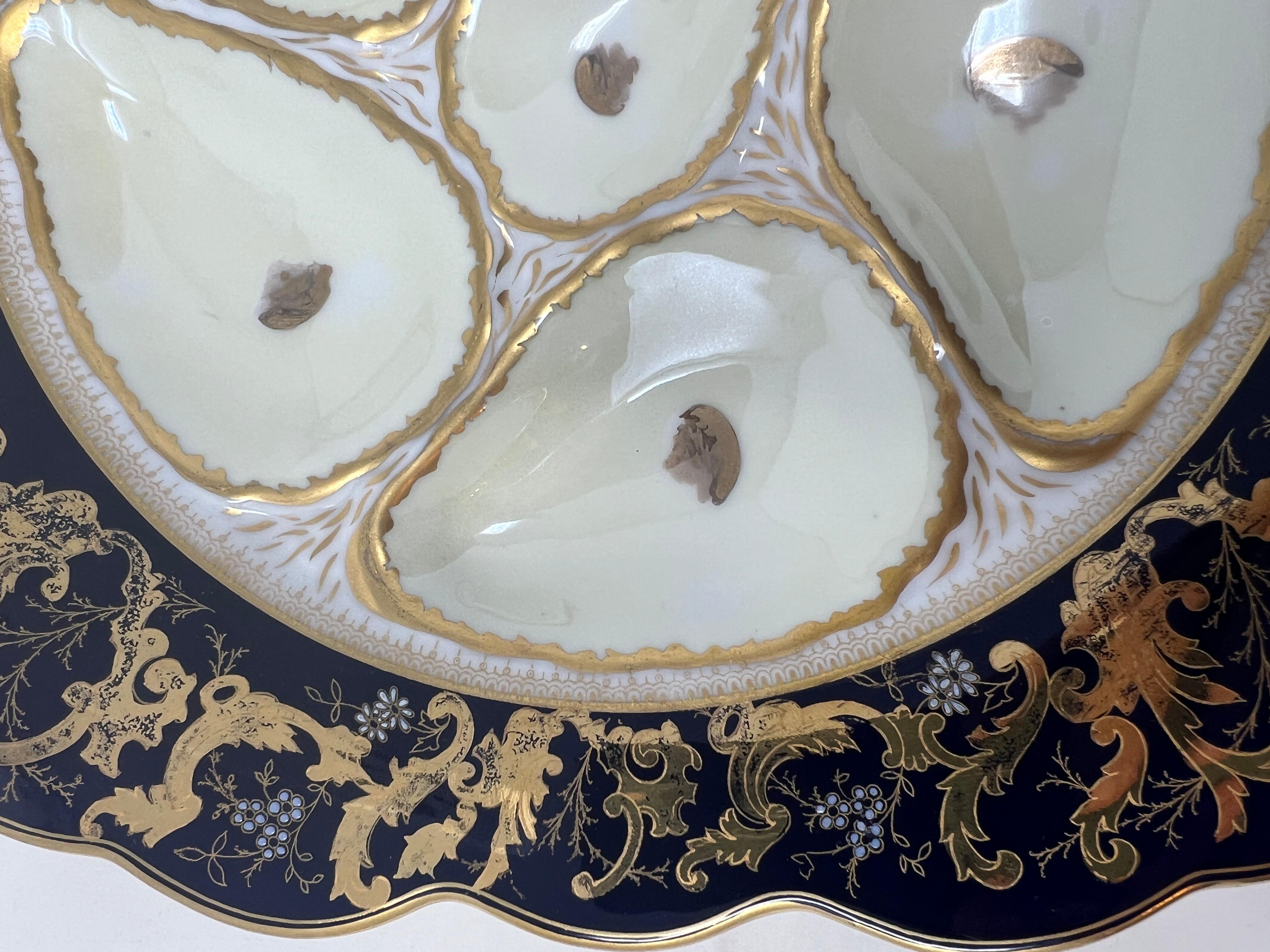 Antiguo plato de ostras de porcelana alemana dorada y azul cobalto fabricado para el minorista de artículos de lujo 