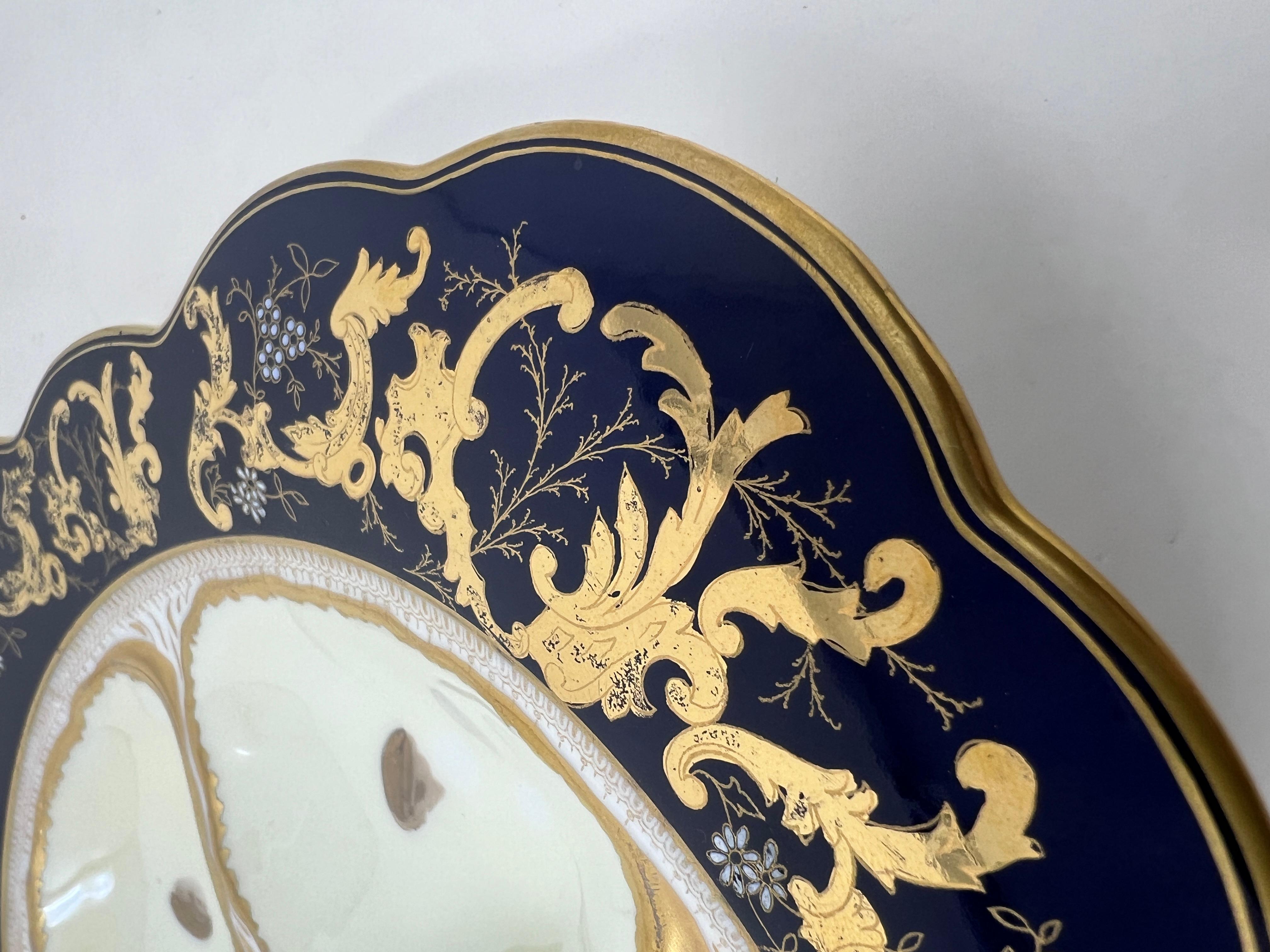 Antiguo plato de ostras de porcelana alemana dorada y azul cobalto para Nathan Dohrmann Co. Alemán en venta