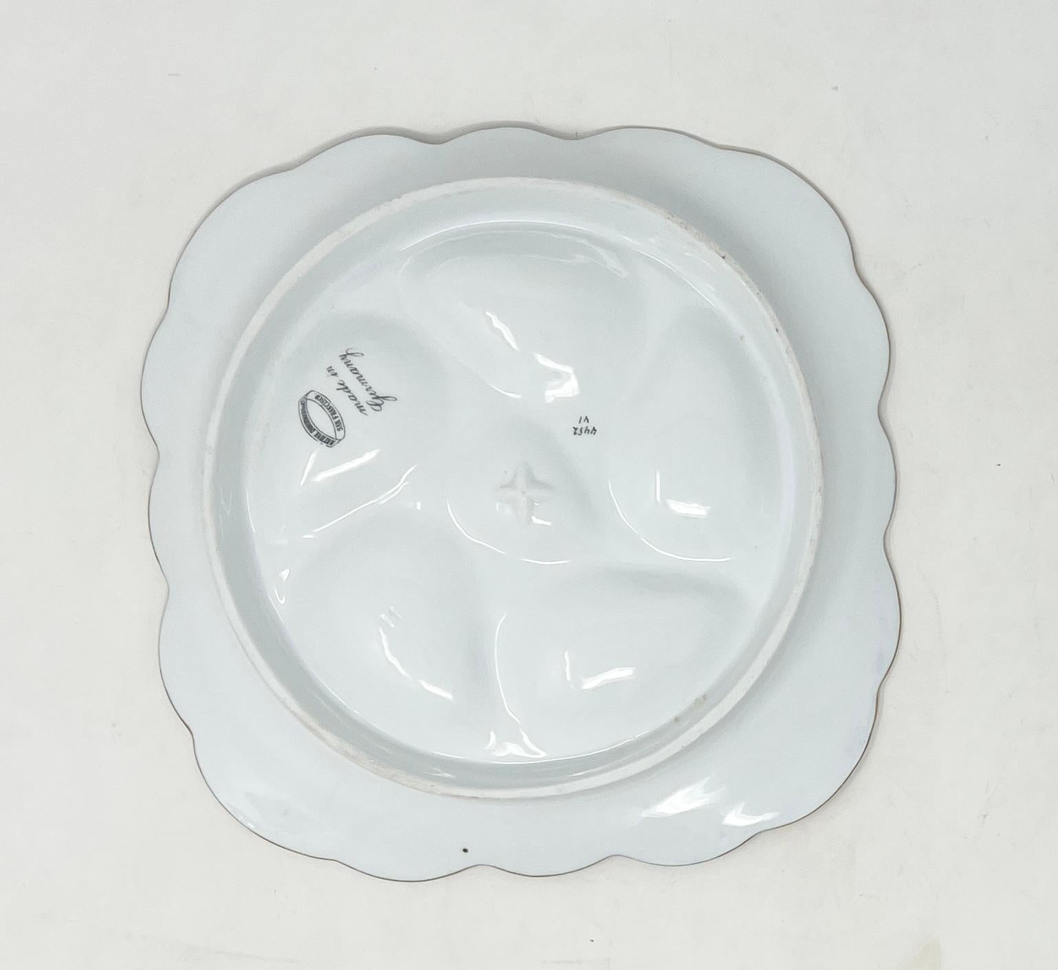 Antiguo plato de ostras de porcelana alemana dorada y azul cobalto para Nathan Dohrmann Co. siglo XX en venta