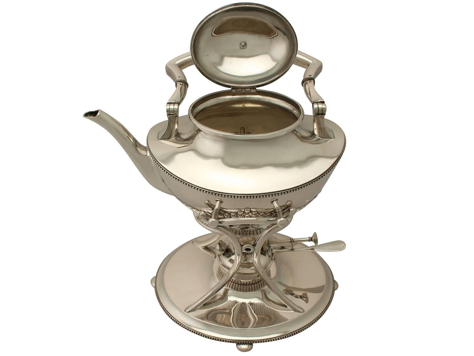 An exceptional, fine and impressive antique German silver spirit kettle on stand in the Queen Anne style; an addition to our antique silver tea ware collection.

This exceptional antique German silver spirit kettle has a plain oval rounded form