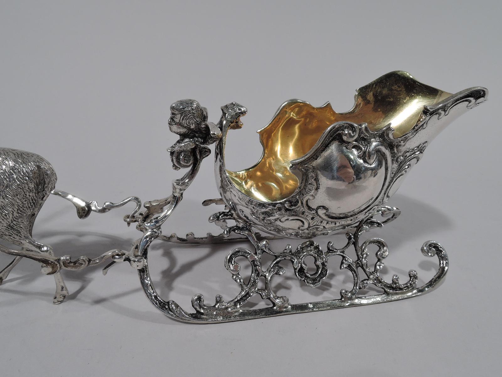 silver reindeer and sleigh