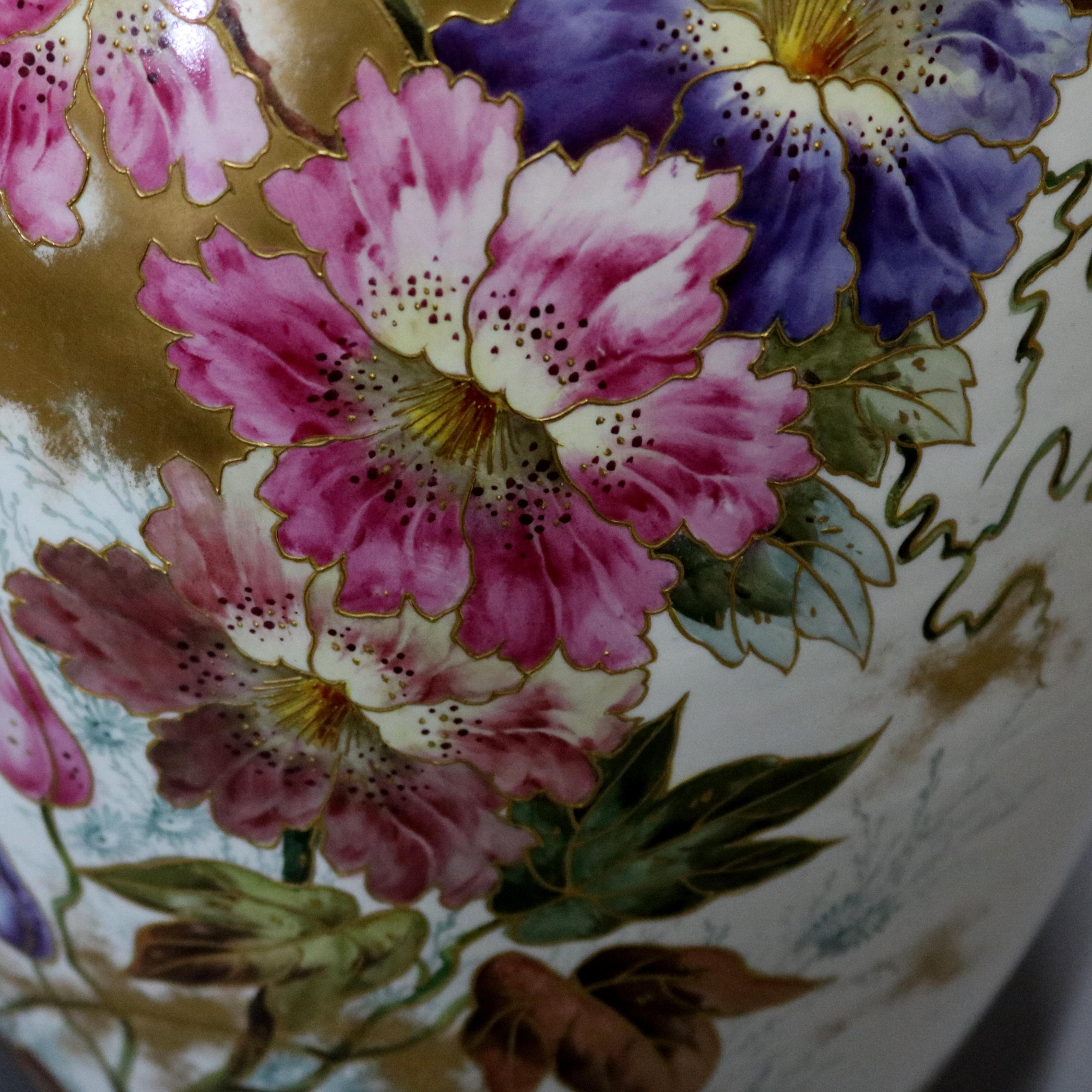 An antique German Royal Bonn hand painted lidded porcelain floor urn features all-over garden flower decoration with gilt highlights throughout. Hand numbered on base as photographed, 19th century.

***DELIVERY NOTICE – Due to COVID-19 we are