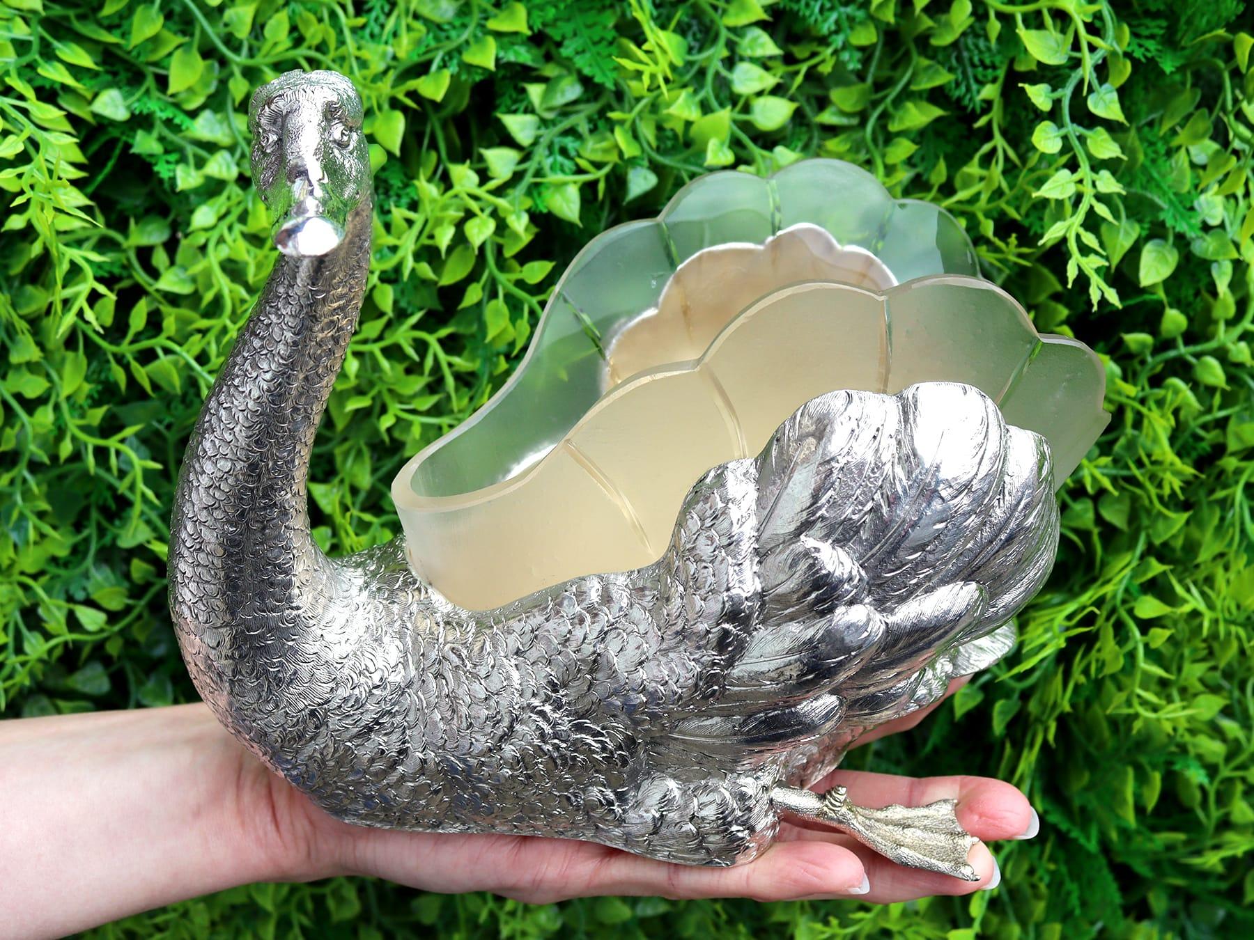 An exceptional, fine and impressive, antique German silver and glass dish / centrepiece modelled in the form of a swan; part of our continental silverware collection.

This exceptional antique German 800 standard silver centrepiece / dish has been