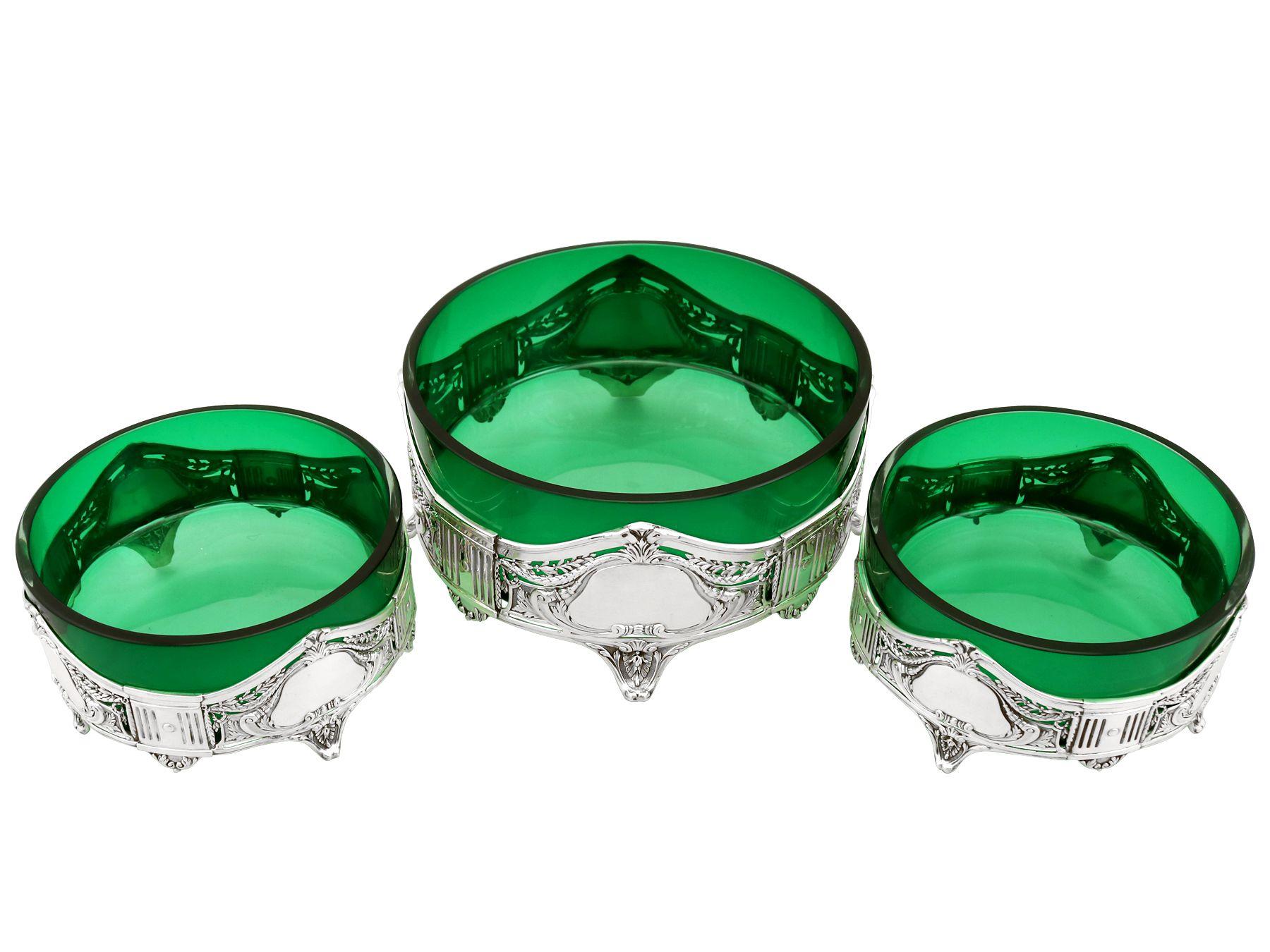 A fine and impressive suite of three antique German silver and green glass dishes, in the Art Nouveau style; an addition to our silver mounted glass collection.

These fine antique German silver and green glass dishes have a circular shaped form