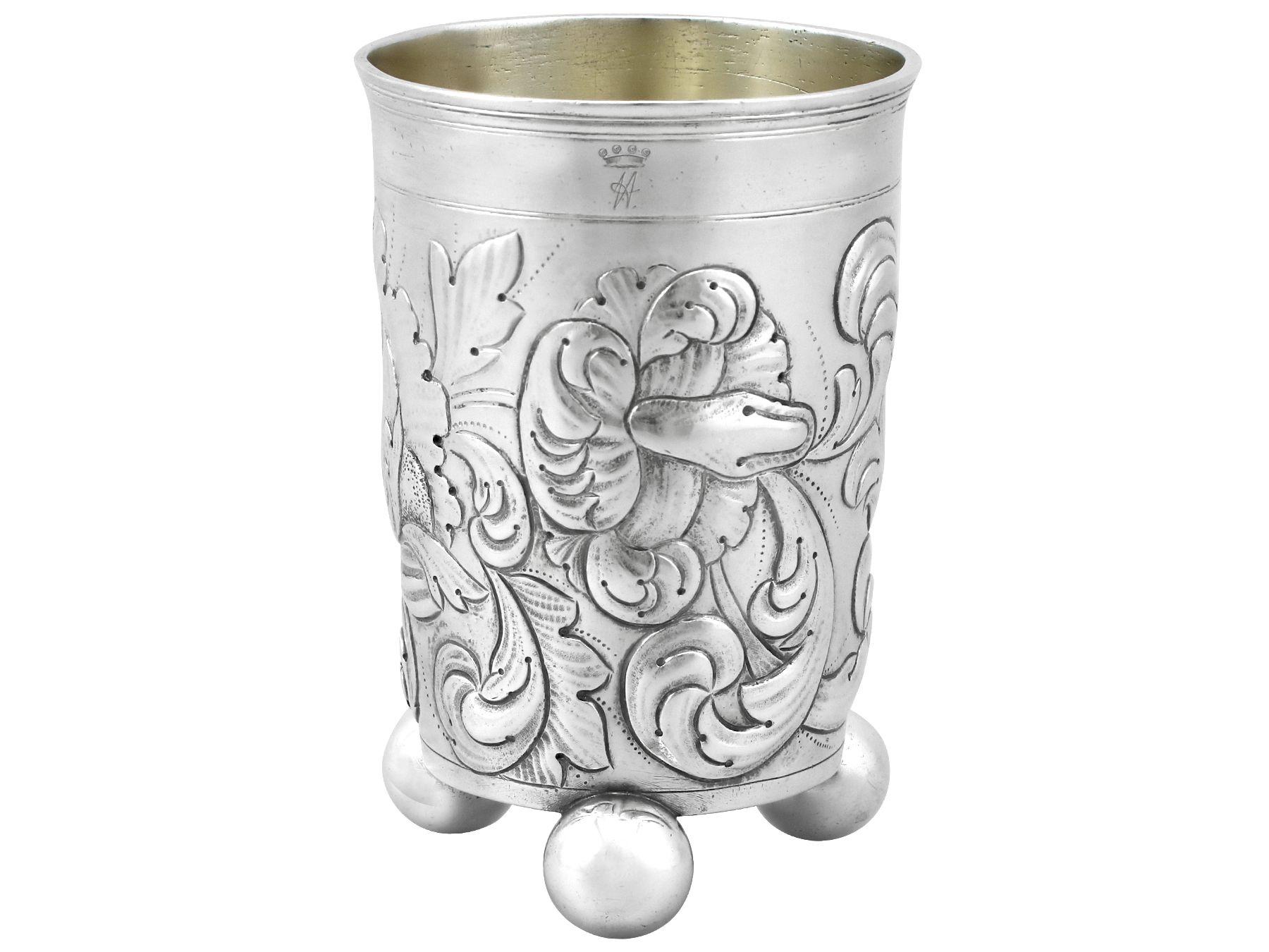 An exceptional, fine and impressive antique German silver beaker; an addition to our continental silverware collection

This exceptional antique German silver beaker has a subtly tapering cylindrical form.

The body of the beaker is embellished
