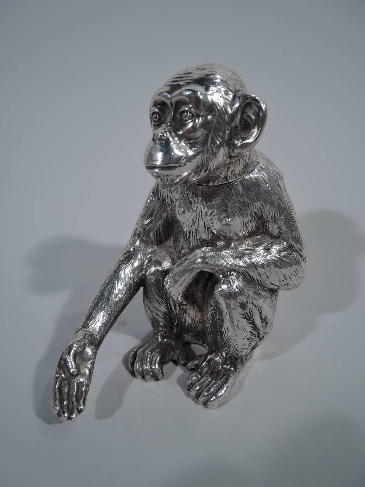 Antique German 800 silver figural box, circa 1910. A crouched chimp extends a paw (hand?) in greeting. Realistic fur, tensile hind feet, and funny oversized ears. A desirable desk companion for philosophical reflections – serious monkey business.