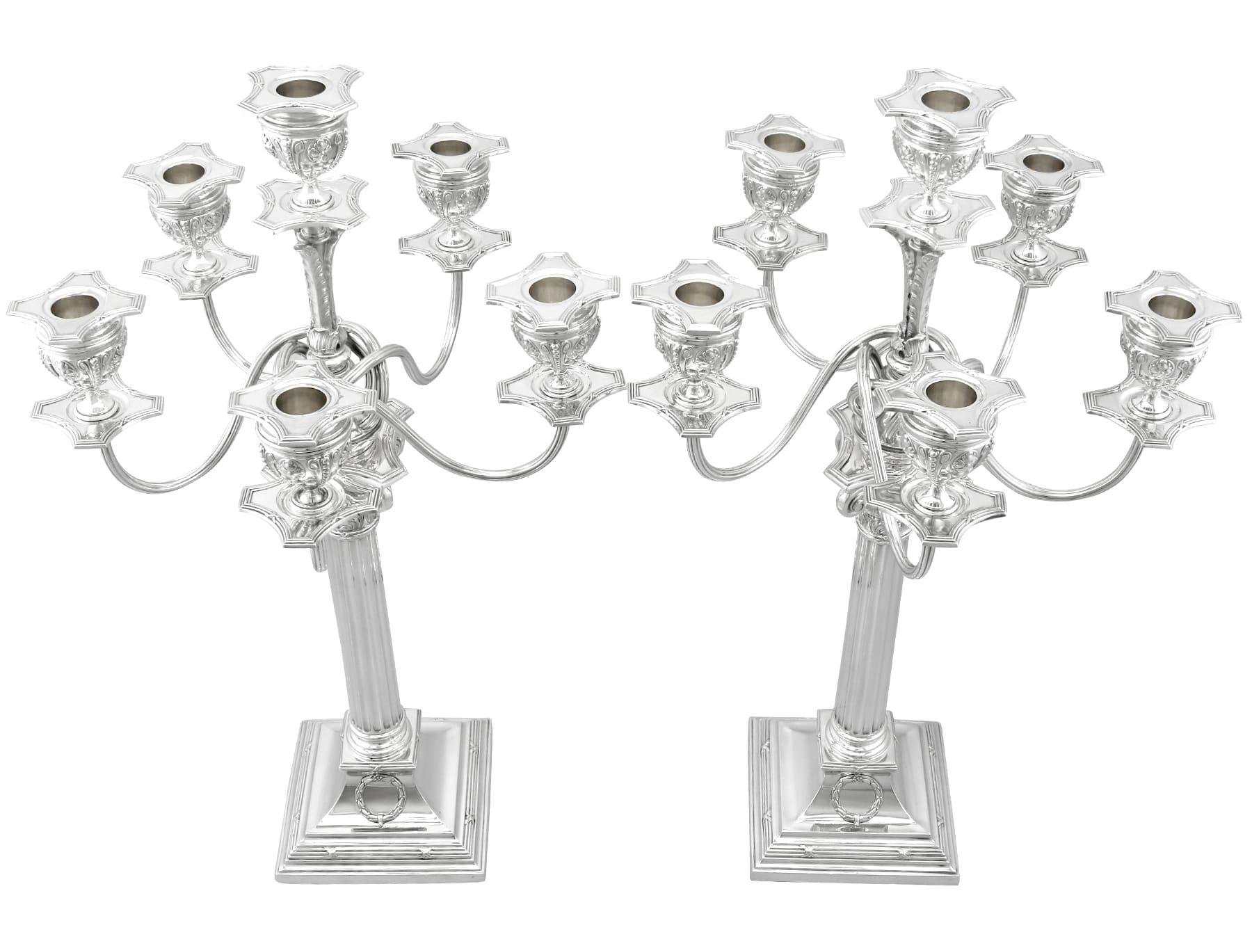 An exceptional, fine and impressive pair of antique German 800 standard silver six-light candelabra; an addition to our ornamental silverware collection
These exceptional antique German silver candelabra have a square shaped form to a cylindrical