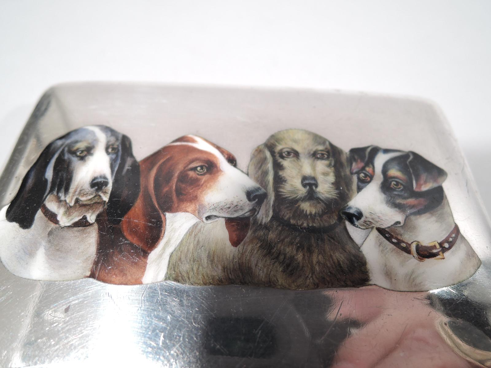 German 800 silver and enamel case, ca 1910. Rectangular and hinged. On cover are enameled 4 hound heads—all floppy ears, saggy jowls, wet noses, and whiskers. A keen-eyed canine group. Interior gilt. German marks. Gross weight: 3.8 troy ounces.