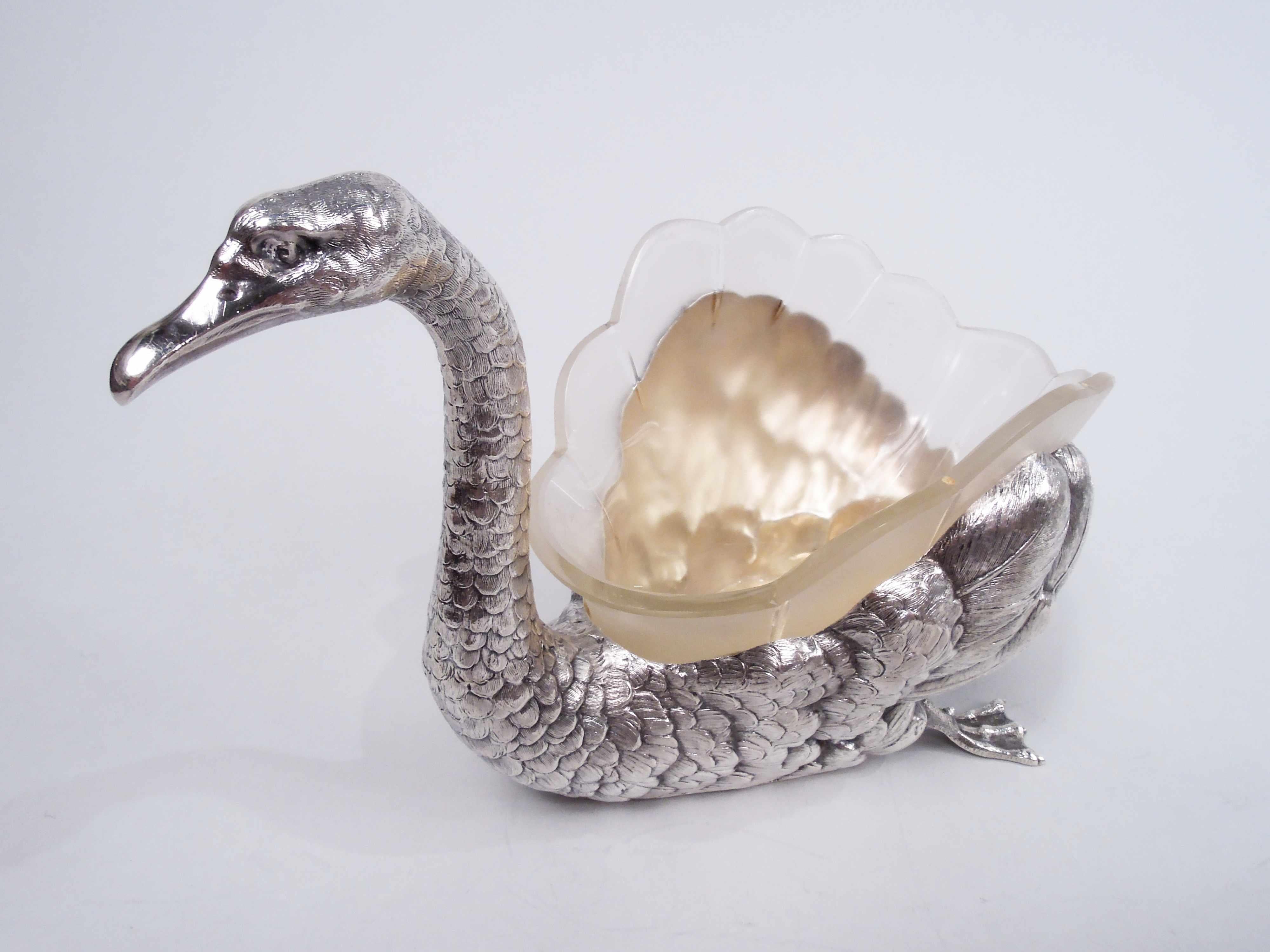 German sterling silver figural bird bowl, ca 1920. A swan with s-scroll neck, closed bill, and direct expression. Webbed feet in glide mode. Fine delineation of feathers from scaly neck to downy wing plumes. Hollow gilt-washed interior; frosted