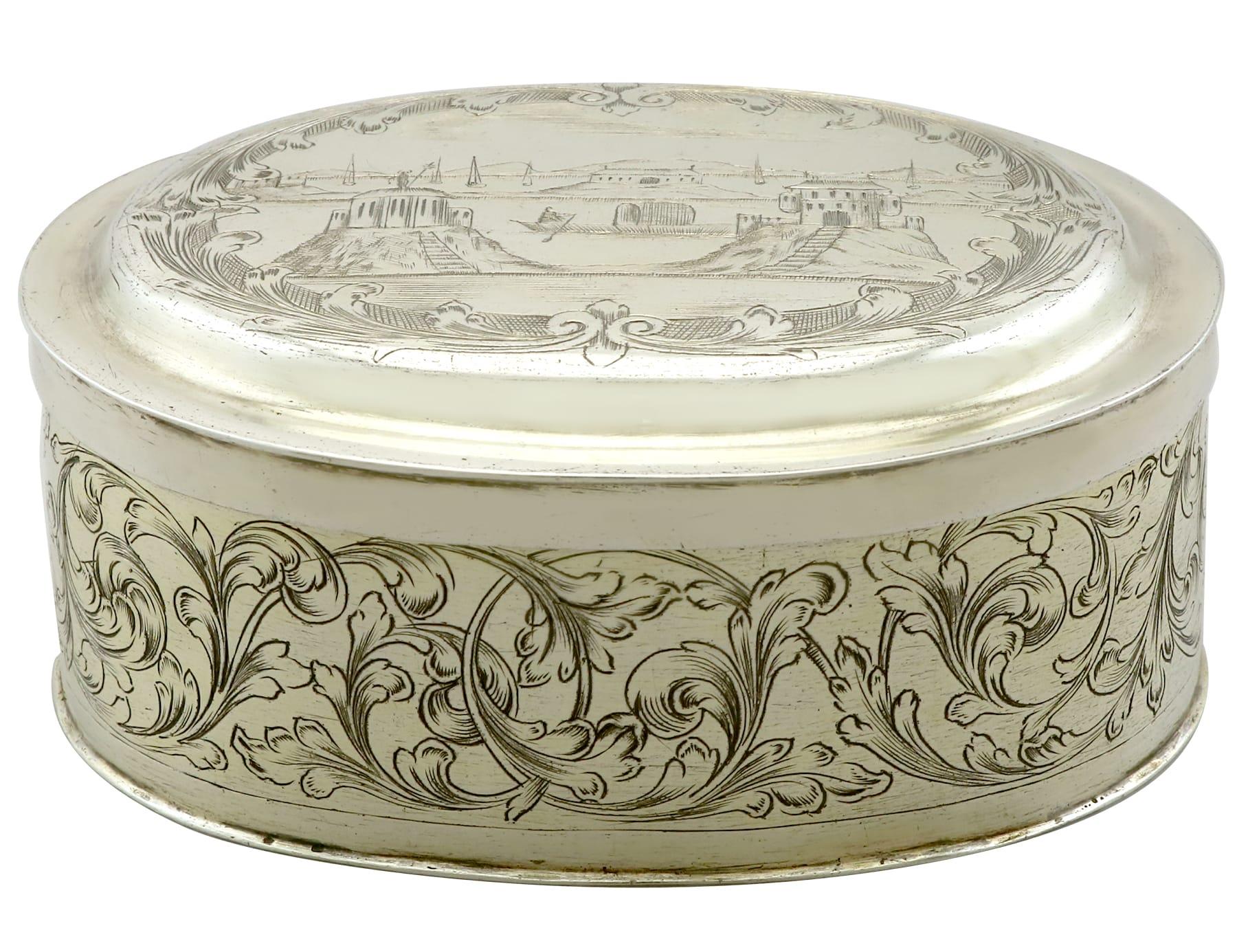 An exceptional, fine and impressive antique German silver gilt tobacco box; an addition to our 17th century silverware collection.

This exceptional antique 17th century German silver gilt tobacco box has an oval form.

The surface of this antique