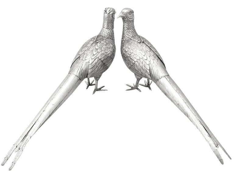 An exceptional, fine and impressive, large pair of antique German 800 standard silver pheasant sugar boxes; part of our continental ornamental silverware collection.

These fine antique German silver sugar boxes have been realistically modelled in