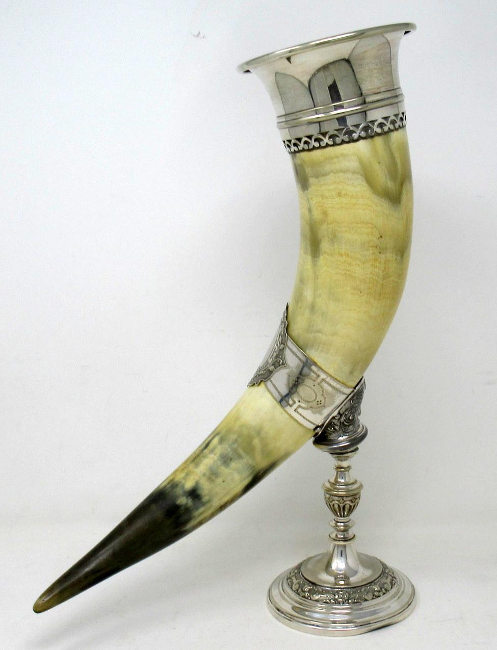 A superb example of a German silver-plated cow horn drinking vessel or centerpiece made by the World-famous silver manufacturers Württembergische Metallwarenfabrik commonly called WMF. Circa 1900. 

The unusually large horn with a wide band and