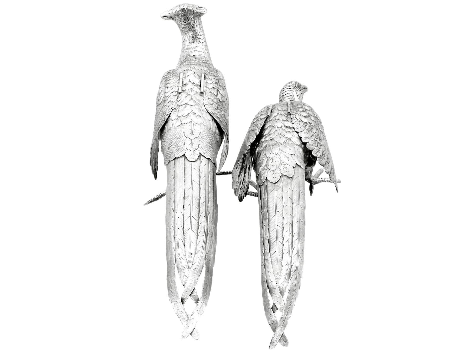 An exceptional, fine and impressive, large pair of antique German silver table pheasants, part of our continental ornamental silverware collection.

These exceptional antique cast German silver table ornaments have been realistically modelled in