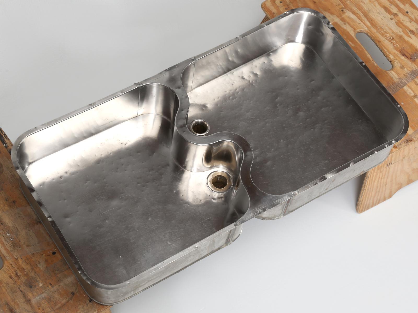 German silver undermount sink, recently removed from an early 1900s house in Chicago and was fully functional, with no leaks or prior repairs. Probably made by Elkay Manufacturing circa 1920 here in Chicago.
Measurements provided do not include the