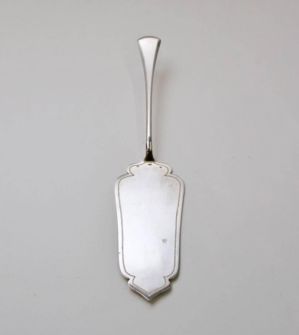 The antique silver plated pie/cake server is German dating from the early 20th century.