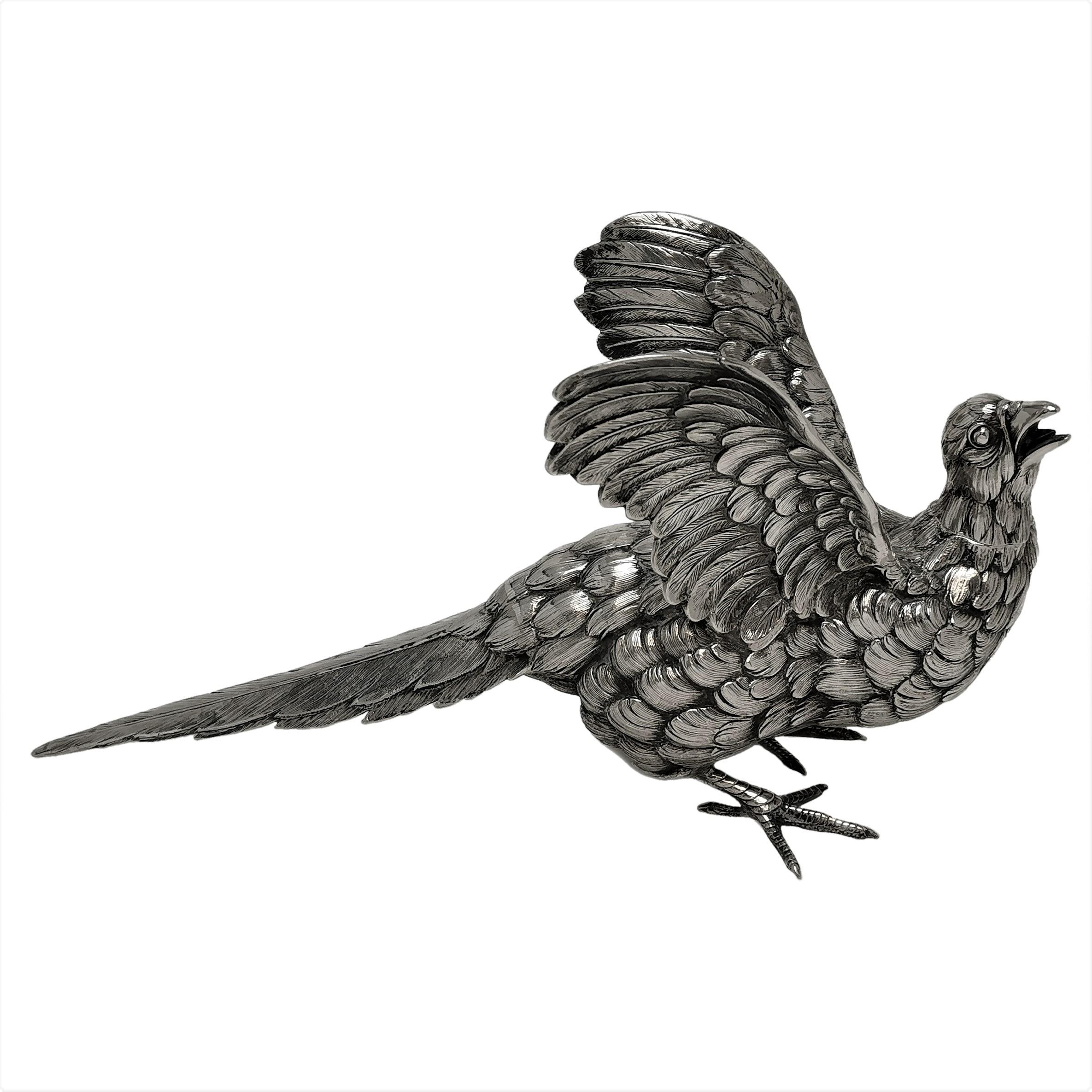 An impressive Antique Solid Silver model Pheasant Bird, modelled in a state of motion with its wings raised and head drawn back. The bird has good attention paid to the detailing in the feathers.

Made in Germany in c. 1900.
Made in 800 Standard