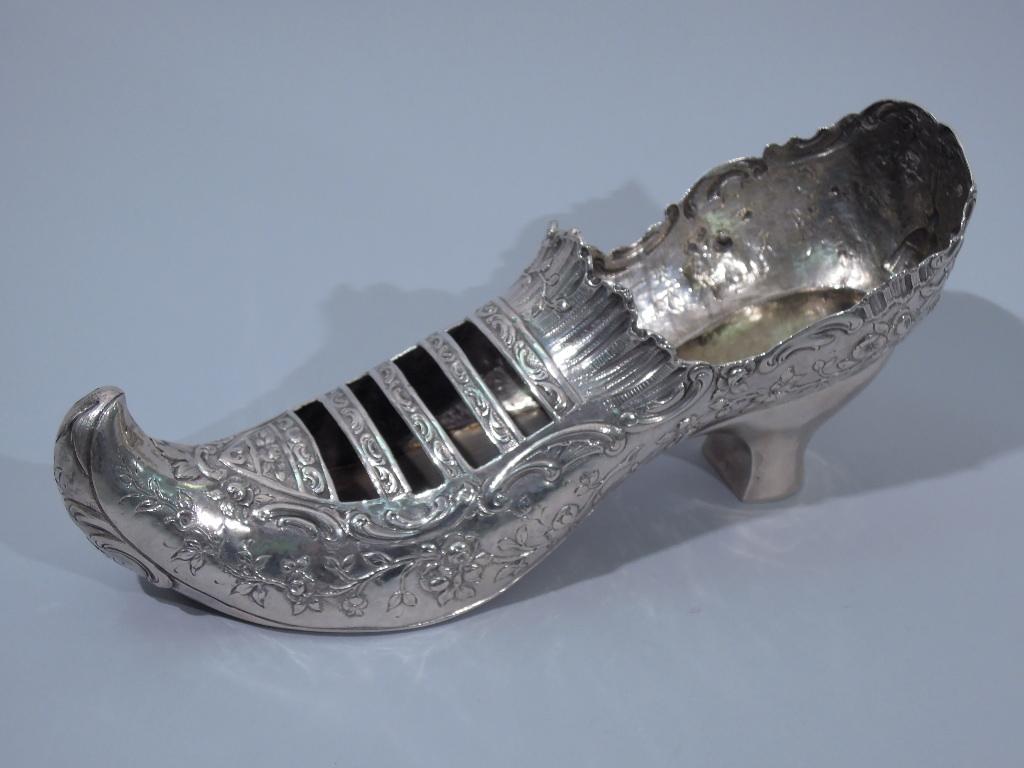 antique silver shoes