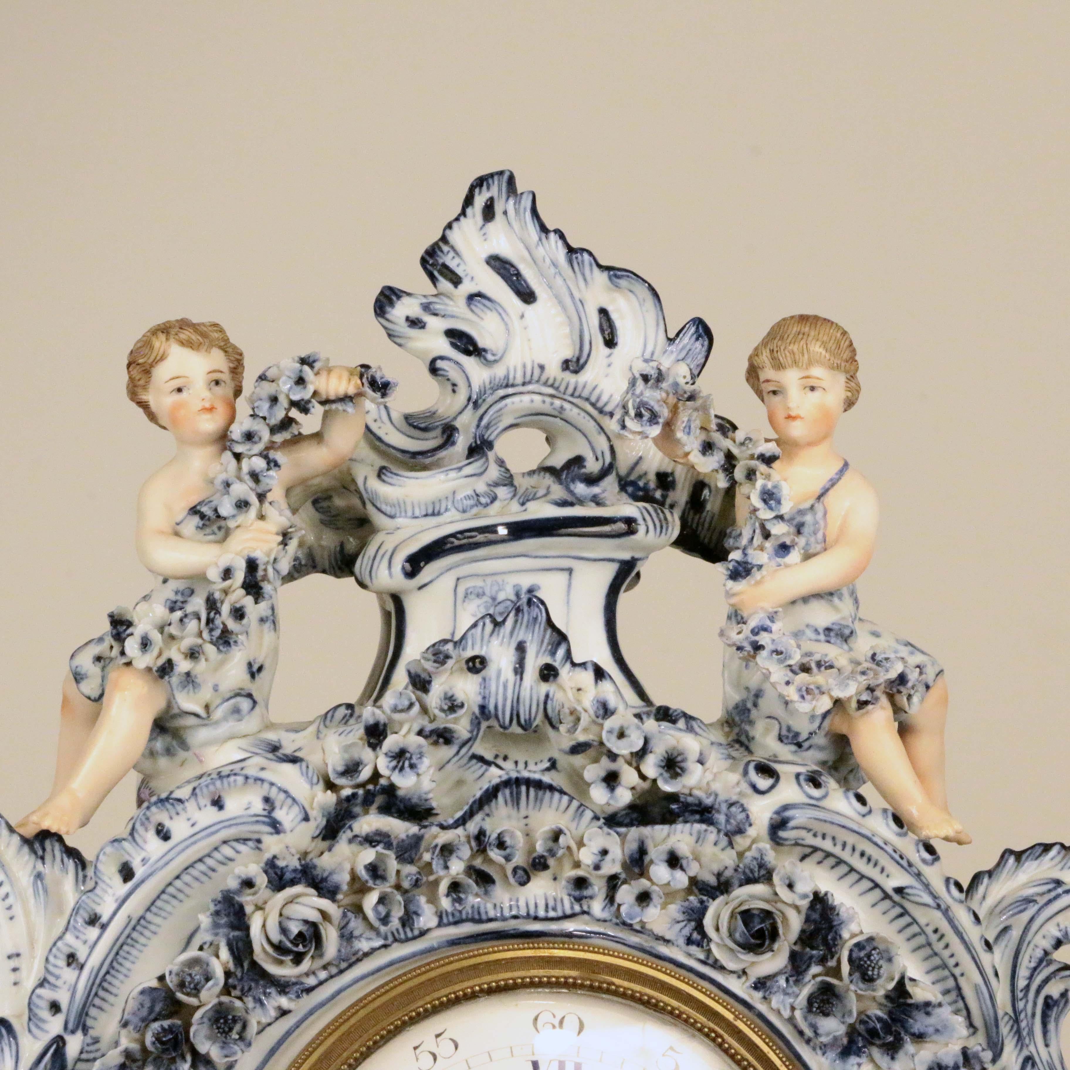 Antique German Three Piece Porcelain Clock Garniture In Good Condition For Sale In Montreal, QC