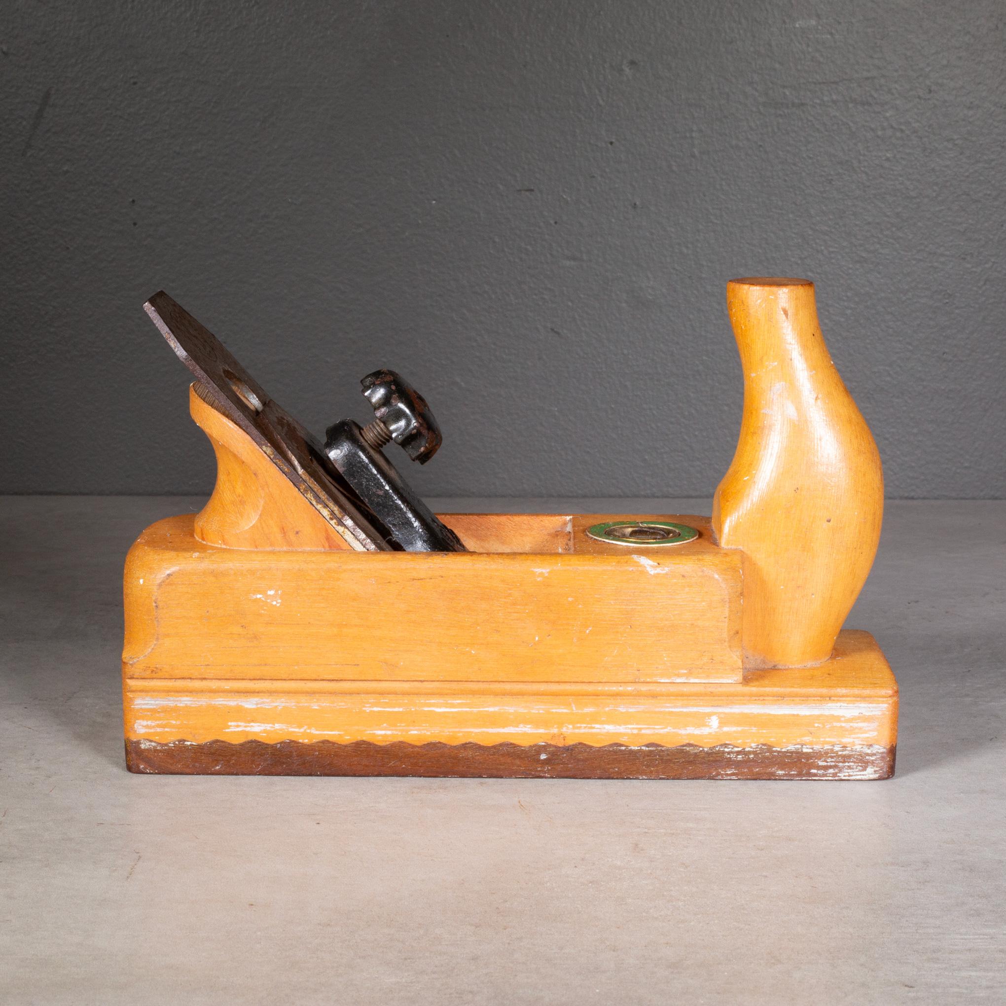 ABOUT

Antique wooden carpentry toothing plane used to make trim and moldings. Lignm Vitae wood on the bottom. Original labels. Shown with life size hand mold for scale. 

    CREATOR Ulmia, Made in Germany. 
    DATE OF MANUFACTURE Early 20th