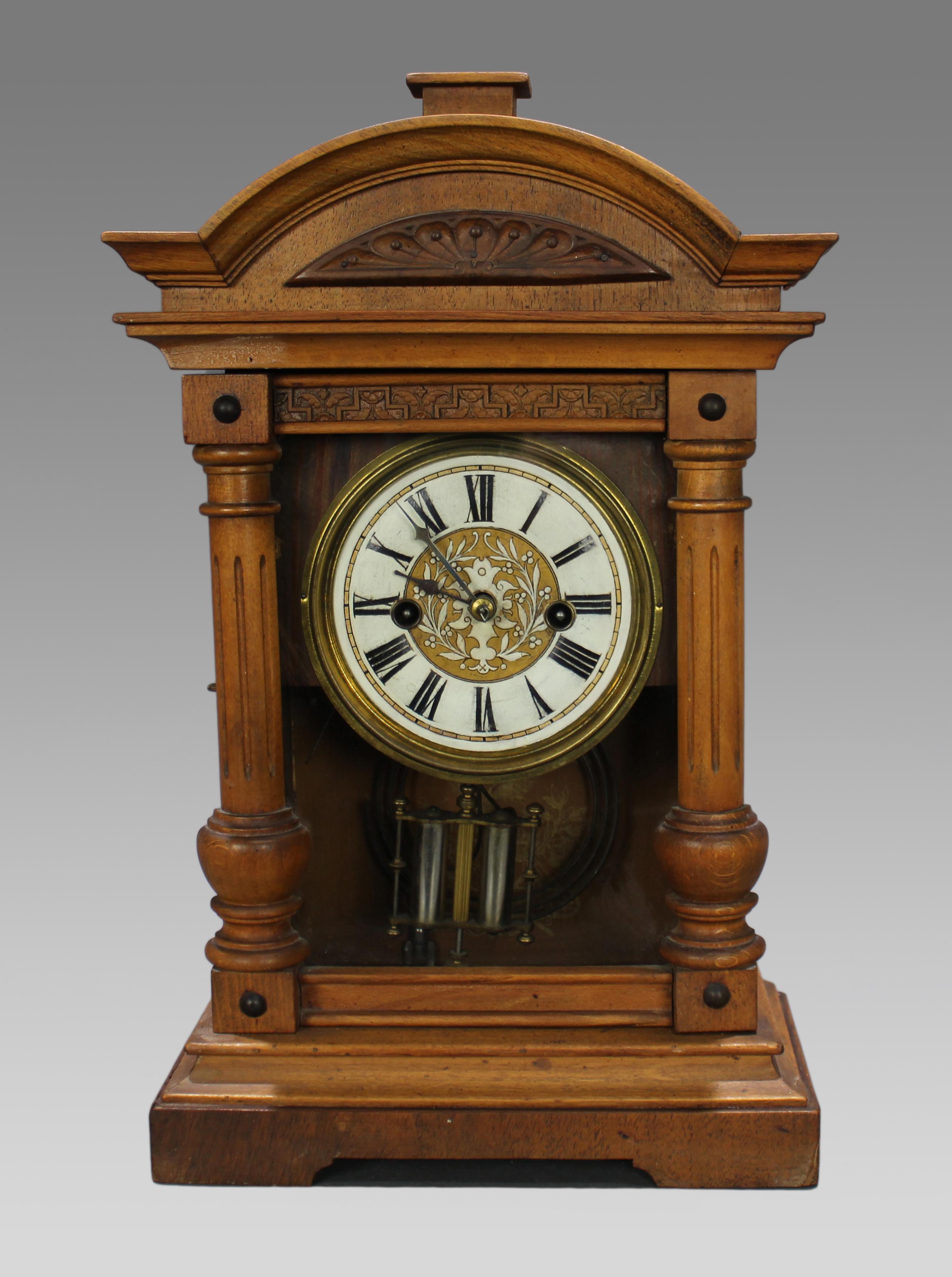 Antique German Wurttemberg Mantle Clock c.1900


German, c.1900, Wurttemberg

Measures 24 x 12 x 38.5 (height) cm

Brass dial with enamel chapter ring. Blued steel hands, Roman numerals

Carved pine case

8 day movement, striking on