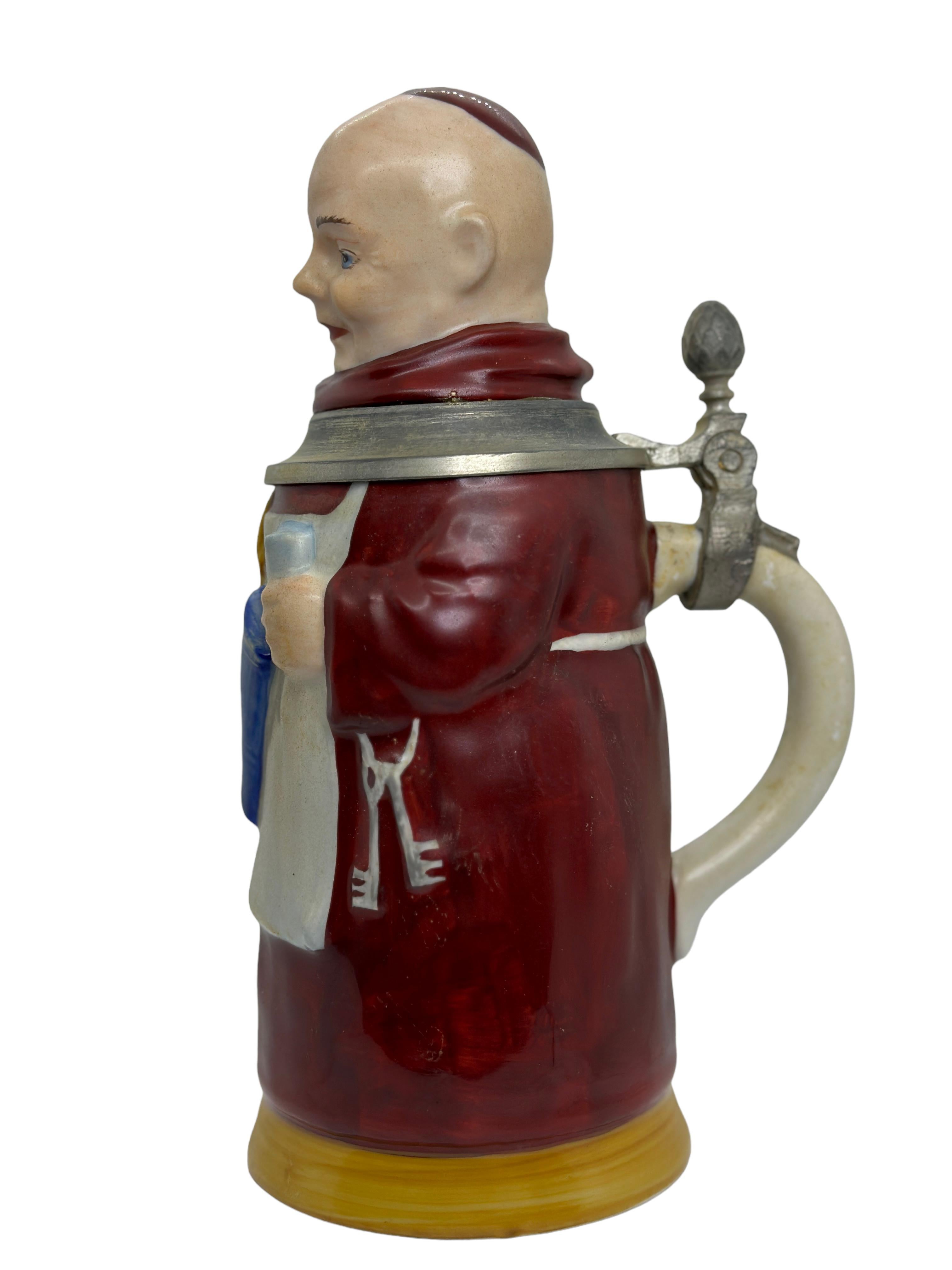 A gorgeous character beer stein - Monk. This character beer stein has been made in Germany circa 1930s or older, attributed to E. Bohne, Thuringia Germany. Absolutely gorgeous piece hand painted and still in great condition. Lid works properly. Nice