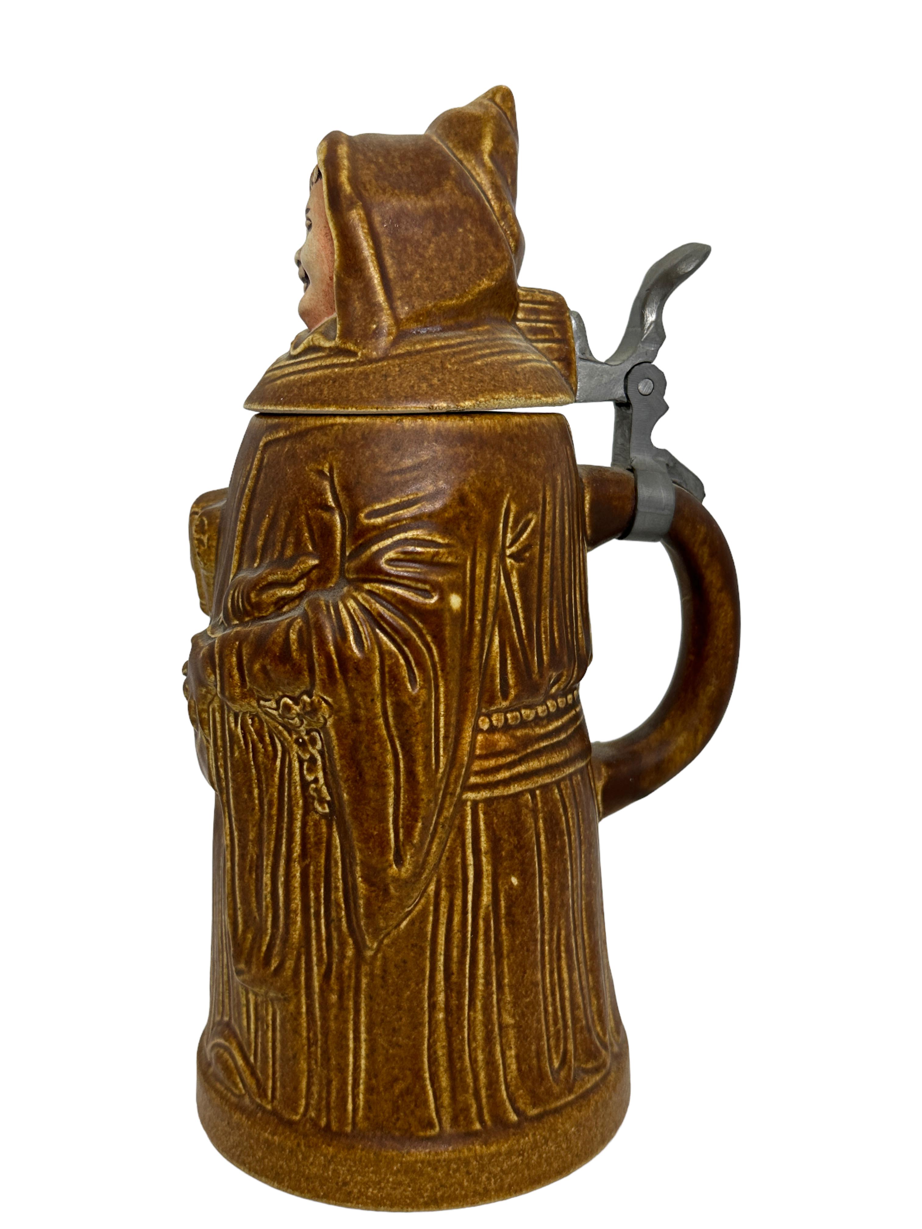 A gorgeous character beer stein - munich child. This character beer stein has been made in Germany circa 1960s or older. Absolutely gorgeous piece handcrafted and still in great condition. Lid works properly. Nice addition to any collection or just