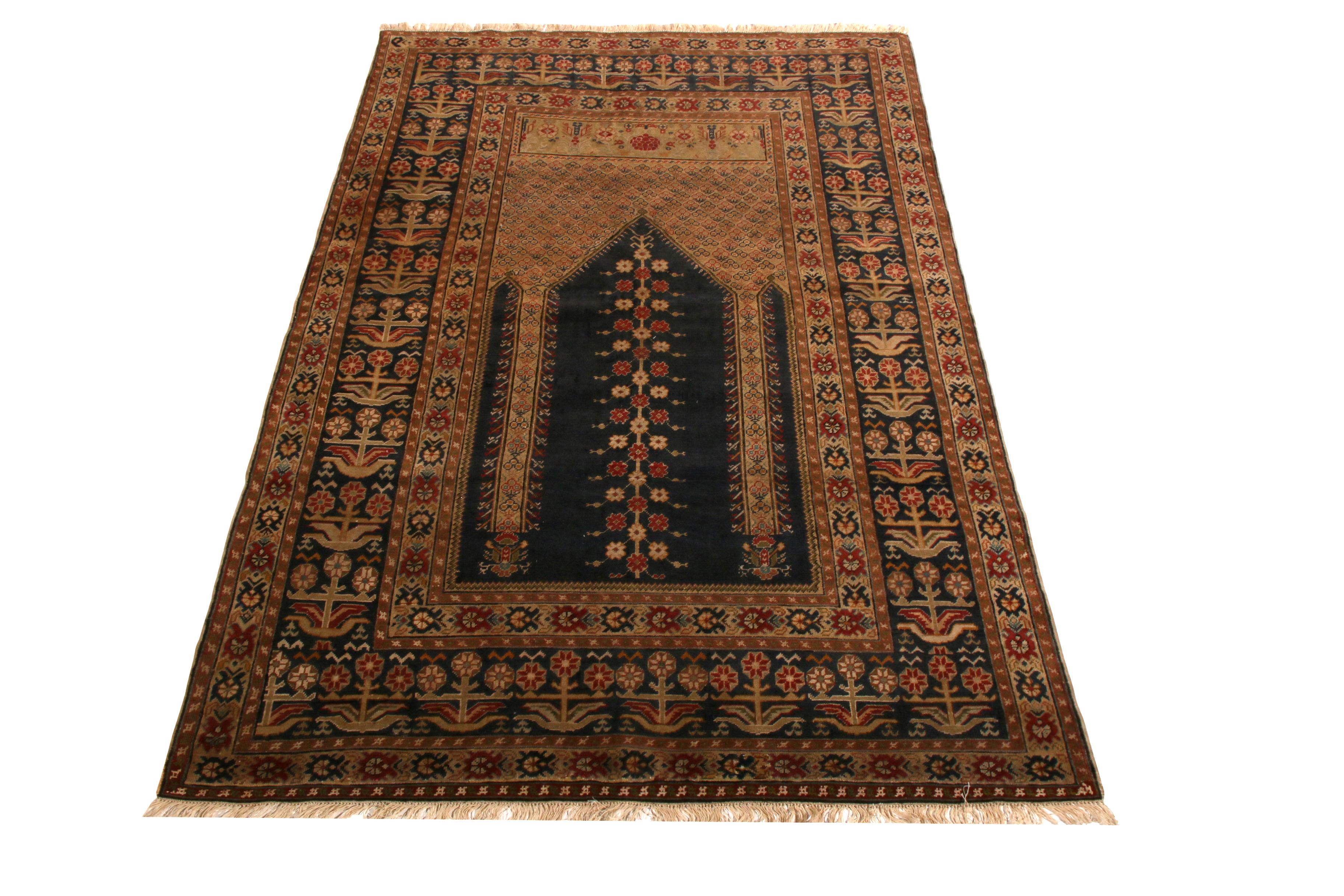 Hand knotted with wool originating from Turkey between 1880-1890, this antique rug hails from the Ghiordes region of former Anatolia, renowned among Classic and traditional rug families for a history of craftsmanship. Employing the celebrated mihrab