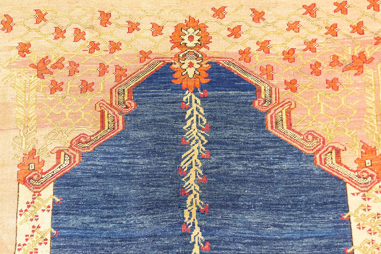 19th Century Antique Ghiordes Rug Blue Field For Sale