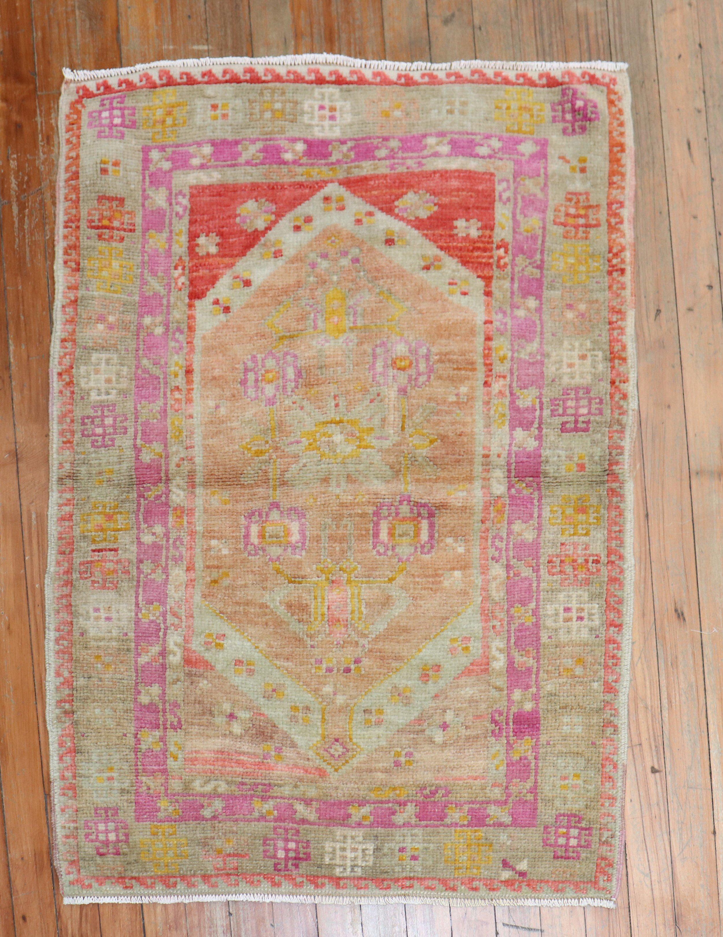 A colorful Turkish Ghiordes rug from the second quarter of the 20th century.

Measures: 2'6'' x 3'4''

Since the beginning of their production in the 18th century, rugs from the Turkish town, Ghiordes have mostly been known for their