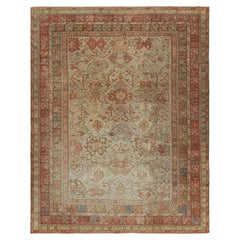 Alfombra antigua Ghiordes con motivos florales en beige, rojo y azul de Rug & Kilim