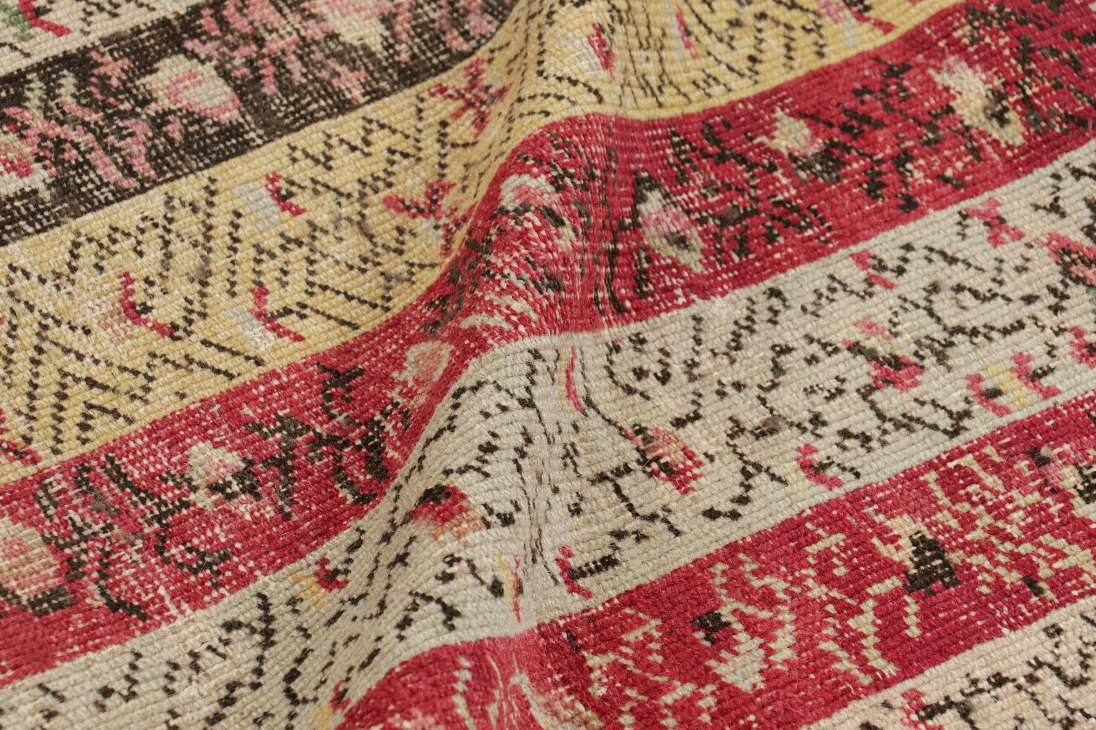 Lana Antico tappeto Ghiordes con strisce policrome e motivi floreali - Rug & Kilim in vendita
