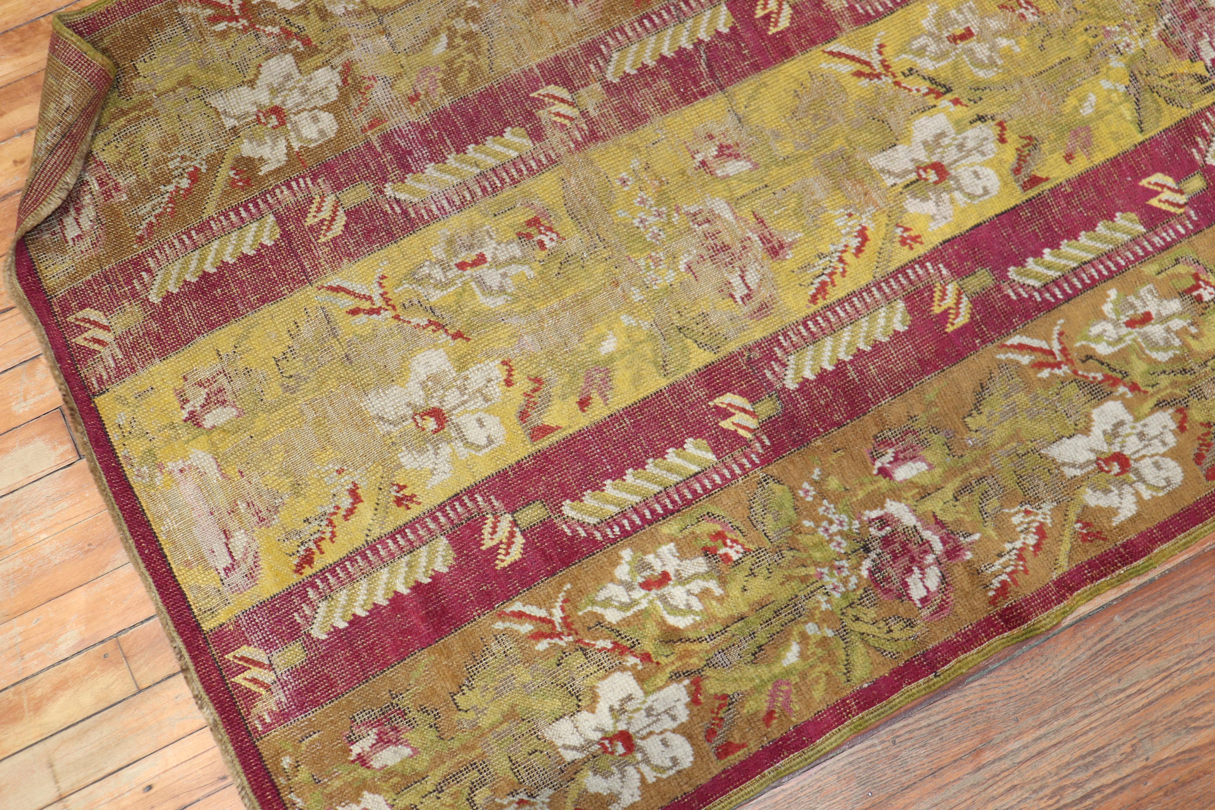 An authentic small Turkish Ghiordes runner with a floral motif.

Measures: 3'6'' x 7'.

 