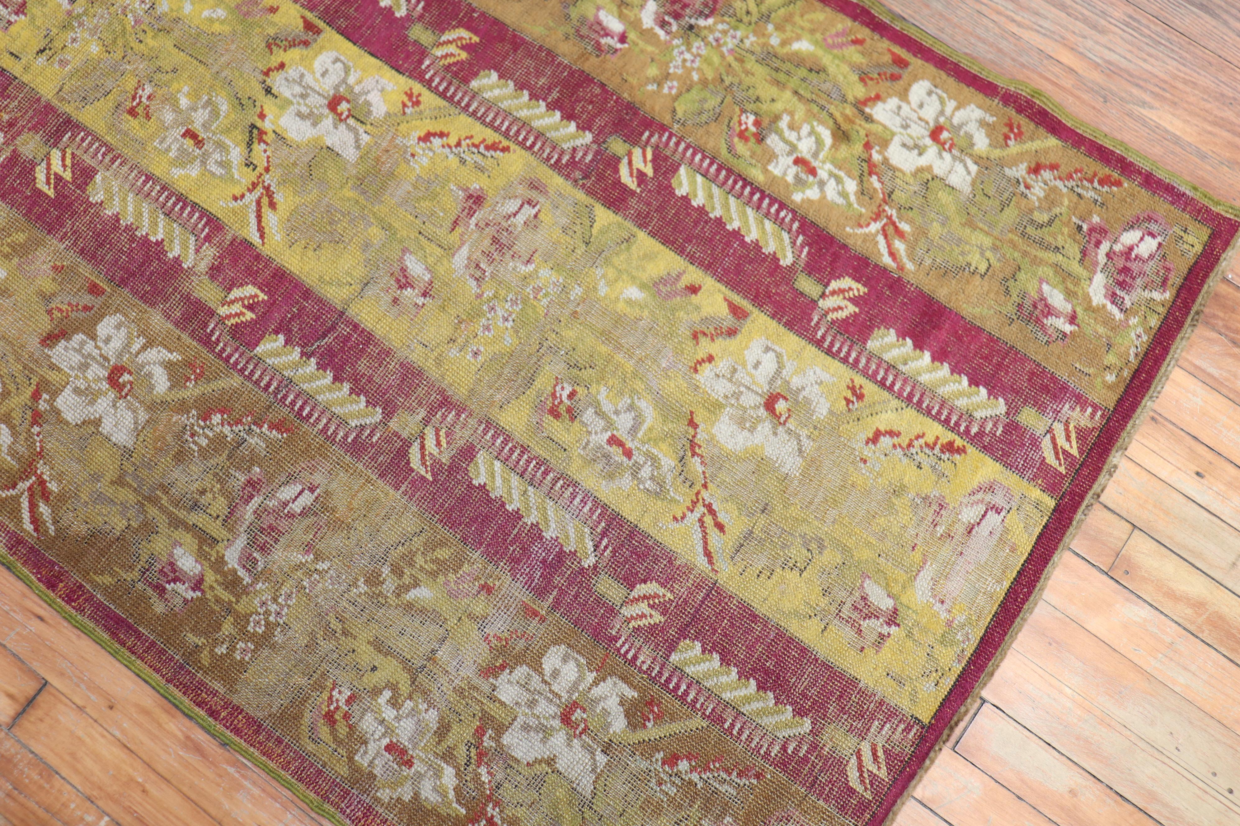 Turkish Antique Ghiordes Small Floral Runner For Sale