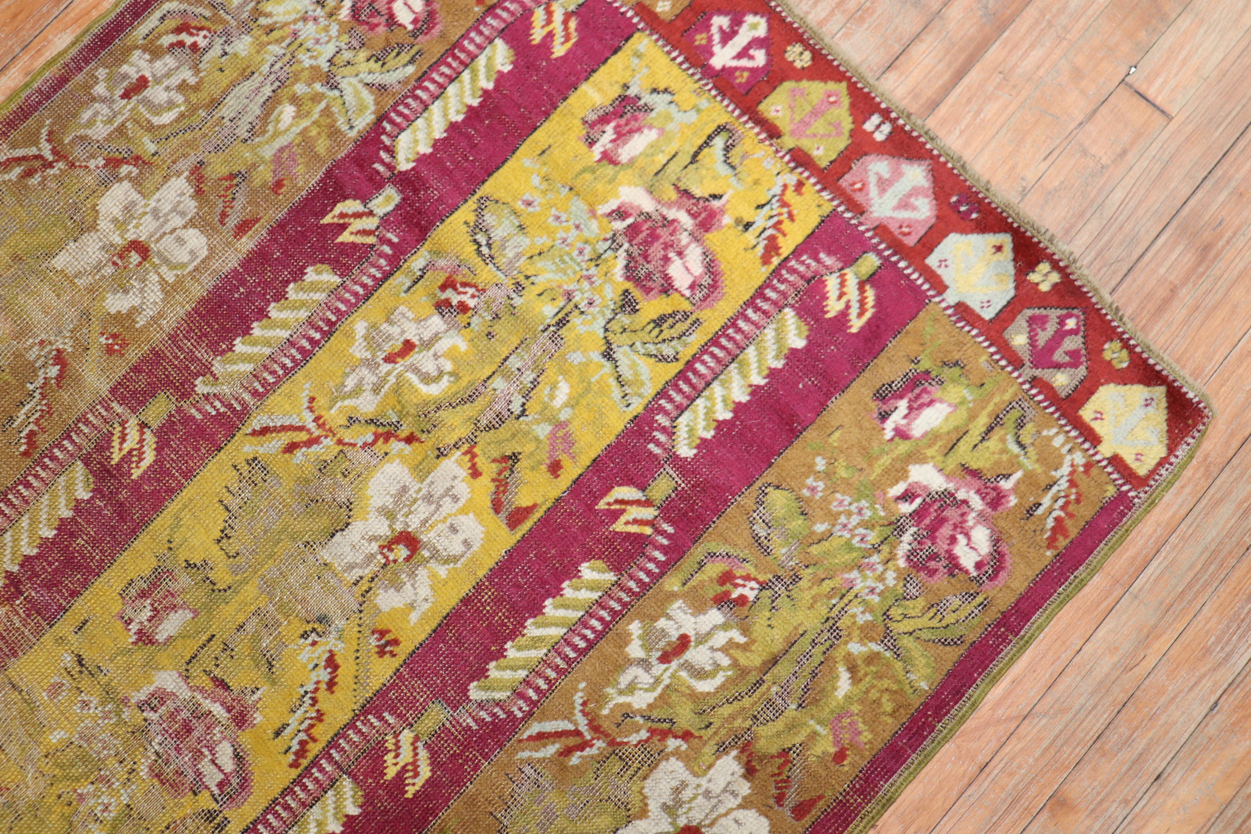 Hand-Woven Antique Ghiordes Small Floral Runner For Sale