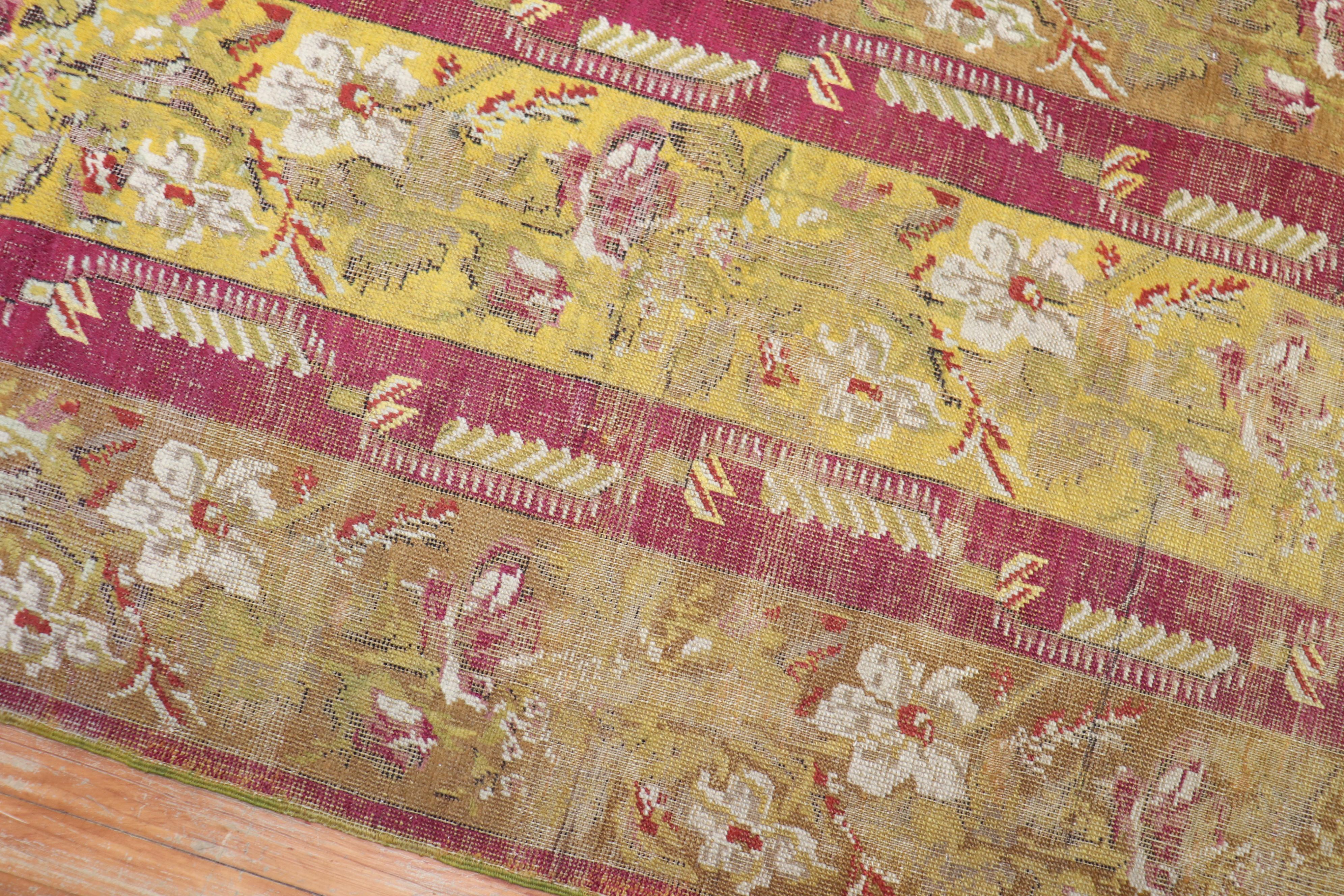 Wool Antique Ghiordes Small Floral Runner For Sale