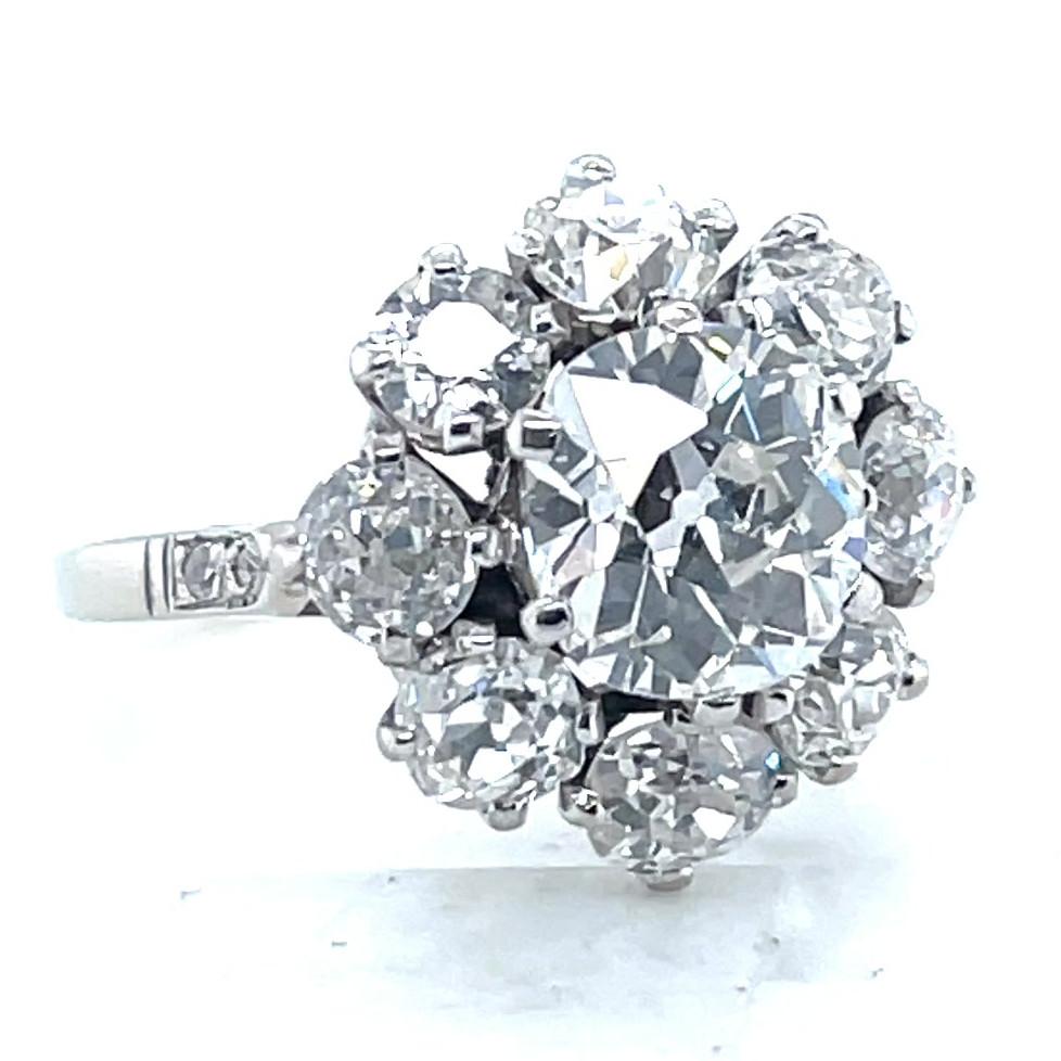 Antique GIA 1.53 Carat Old Mine Cut Diamond White Gold Cluster Ring In Excellent Condition In Beverly Hills, CA