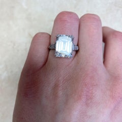 Platinum GIA Certified 6.42 Carat Emerald Cut Diamond Three-Stone Ring