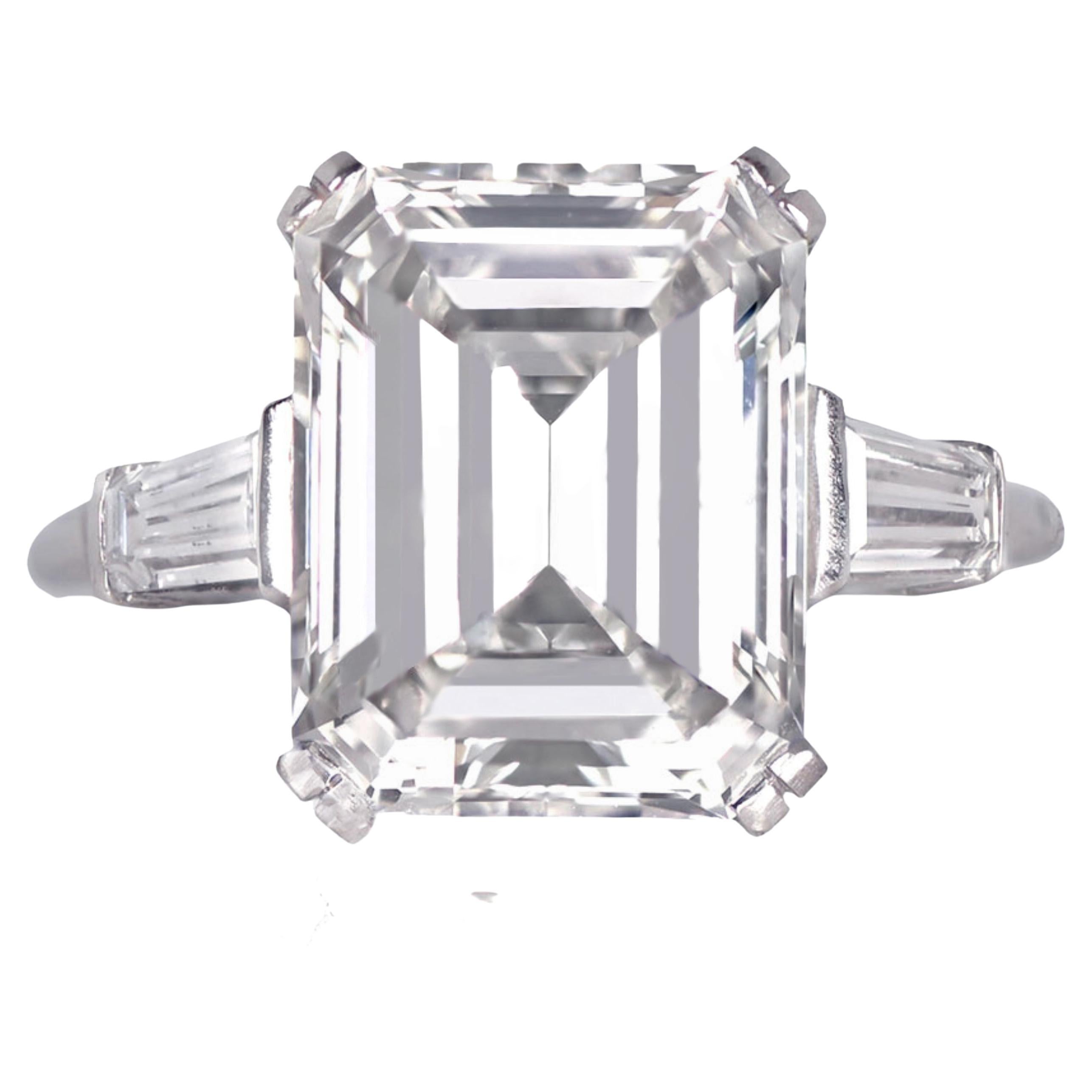 Platinum GIA Certified 6.42 Carat Emerald Cut Diamond Three-Stone Ring For Sale