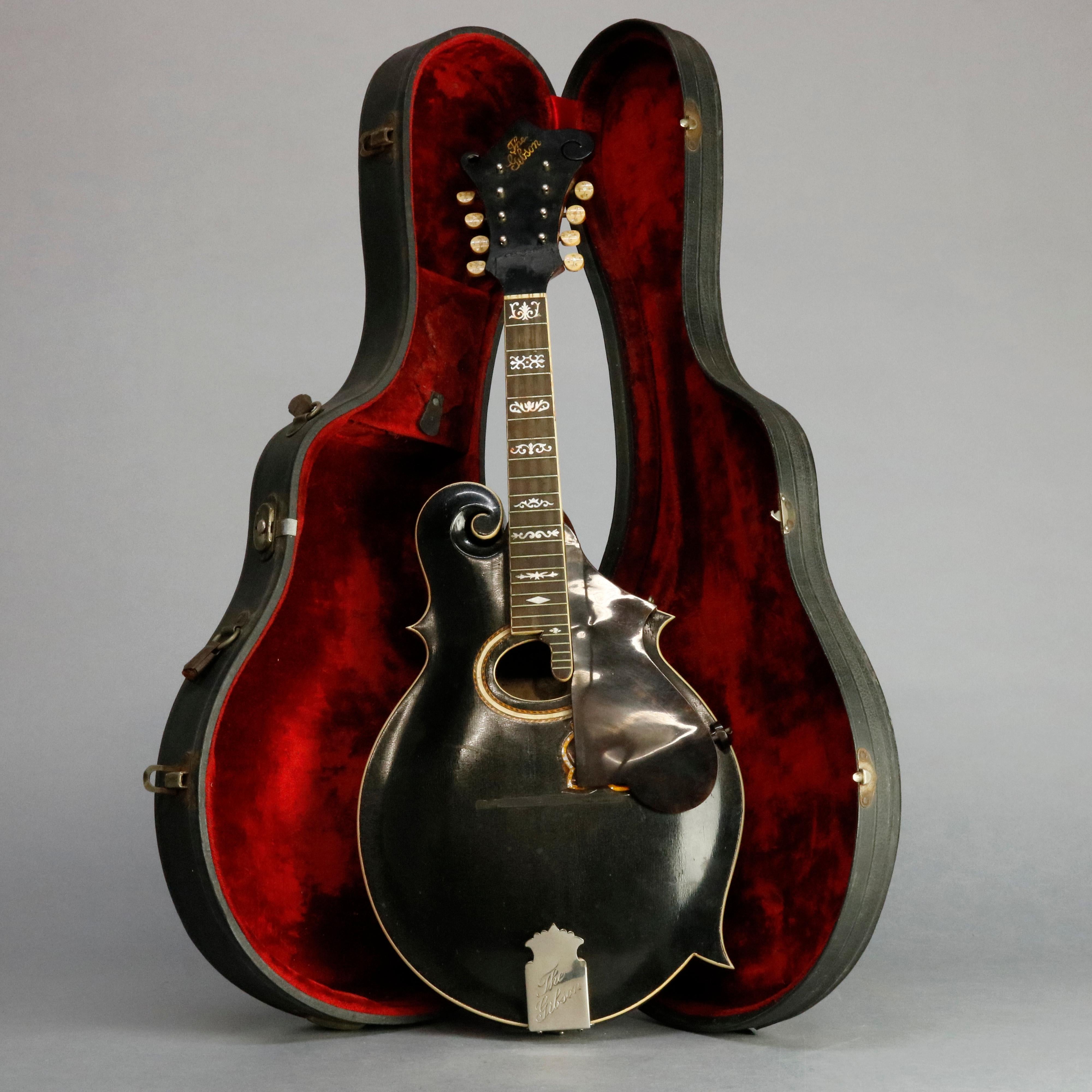 An antique Gibson Mandolin-Guitar and case, 